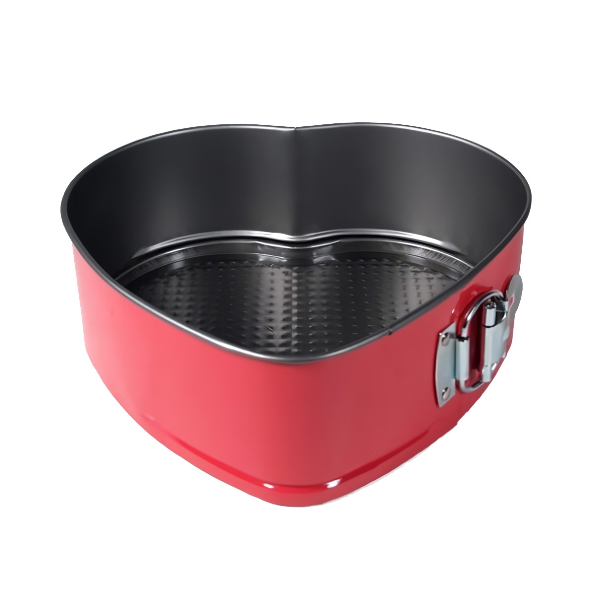 Molde para pastel en forma de corazón rojo con cierre plateado. La sartén está vacía.