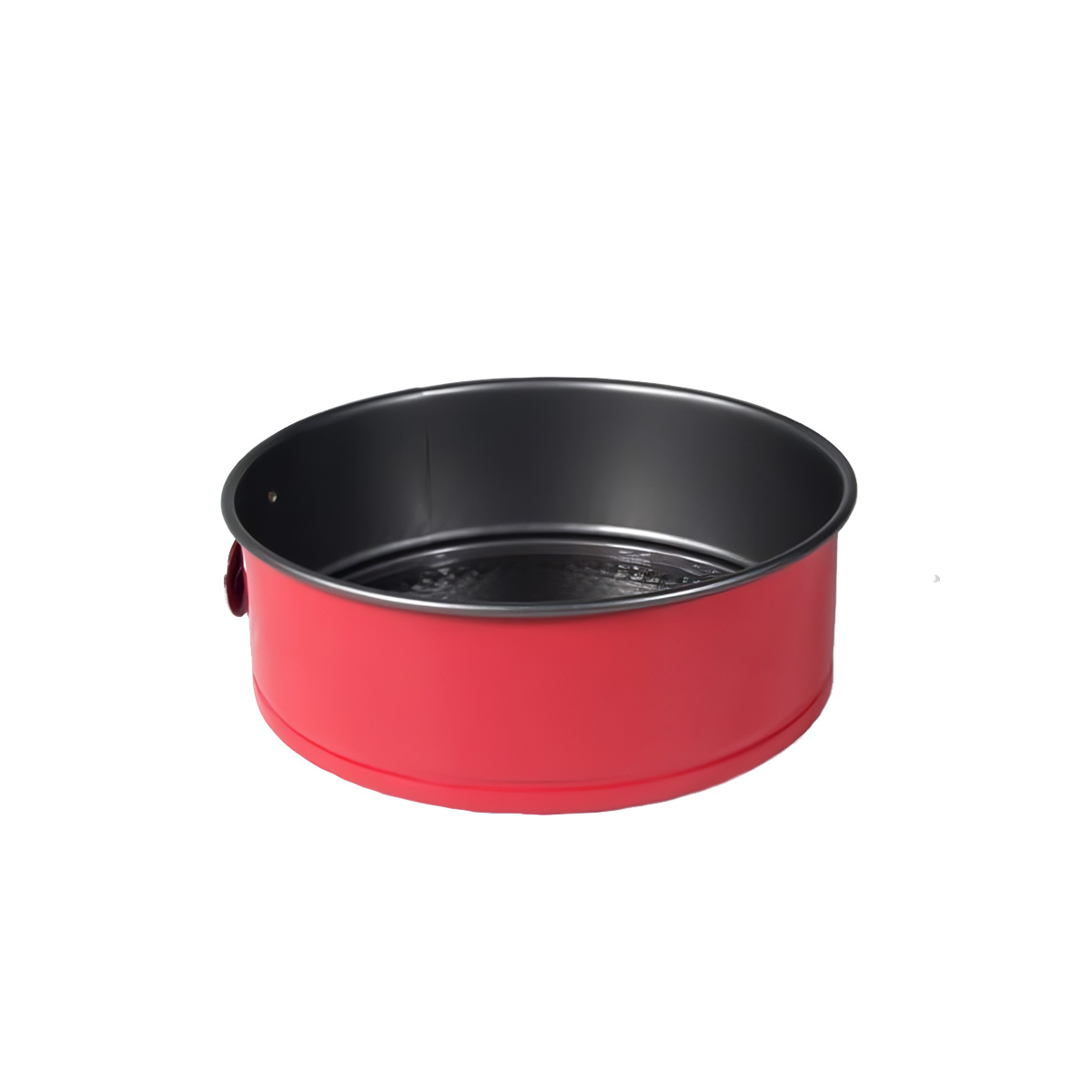 Un molde para hornear rojo con interior negro, con cierre. Está sobre un fondo blanco.