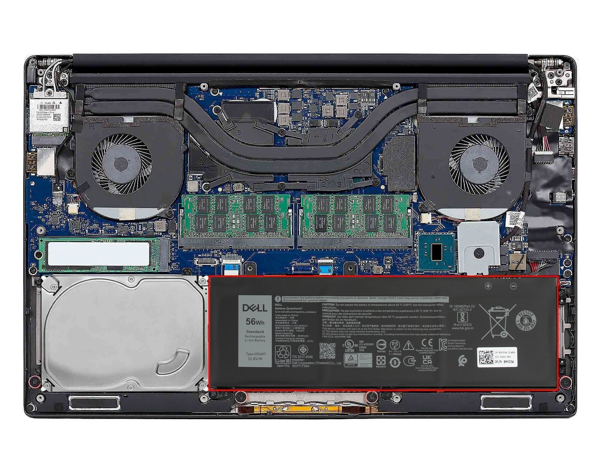 Interne Komponenten des Laptops sind sichtbar, einschließlich Akku, Lüfter, Festplatte und Leiterplatte.