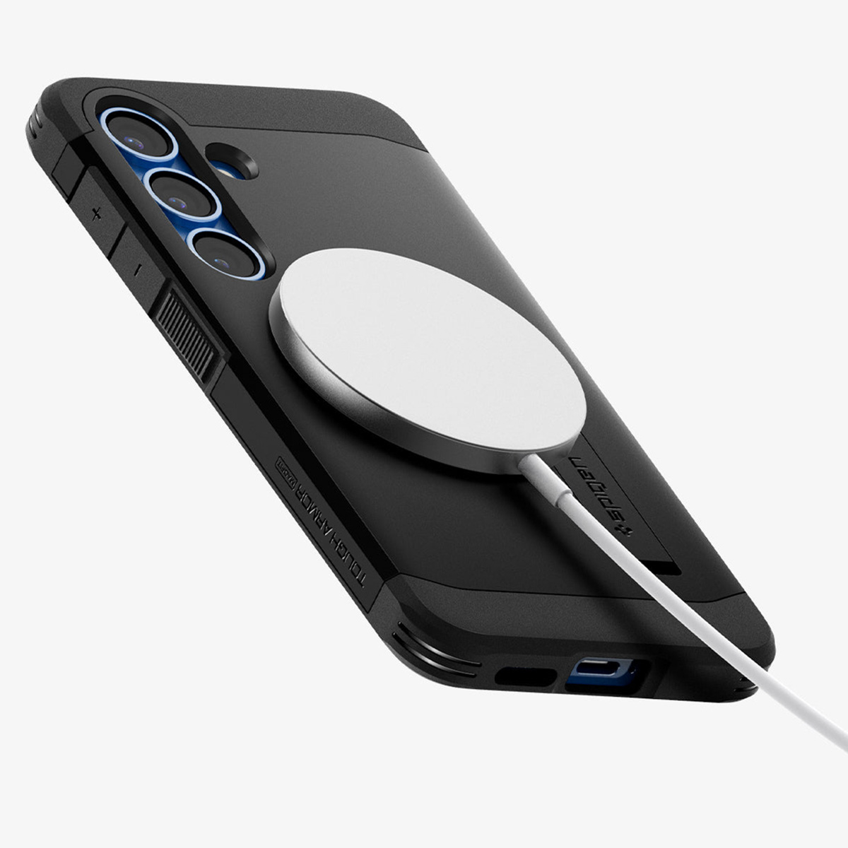 Étui de téléphone noir avec un cercle argenté. Il est connecté à un câble de chargement blanc.