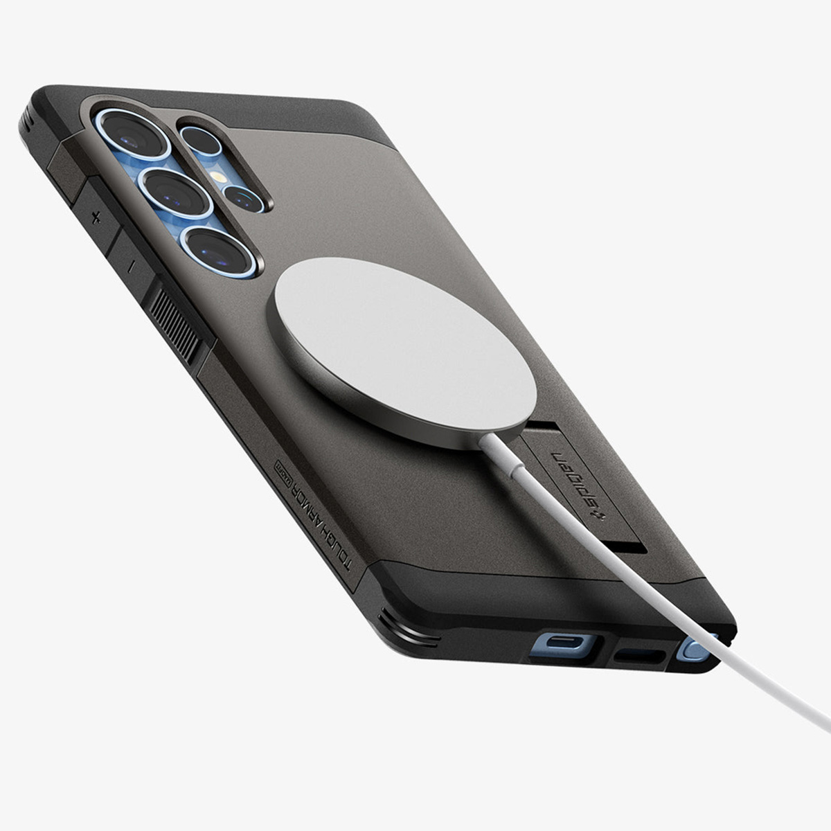 Een grijze telefoonhoes met een witte draadloze oplader eraan vast.
