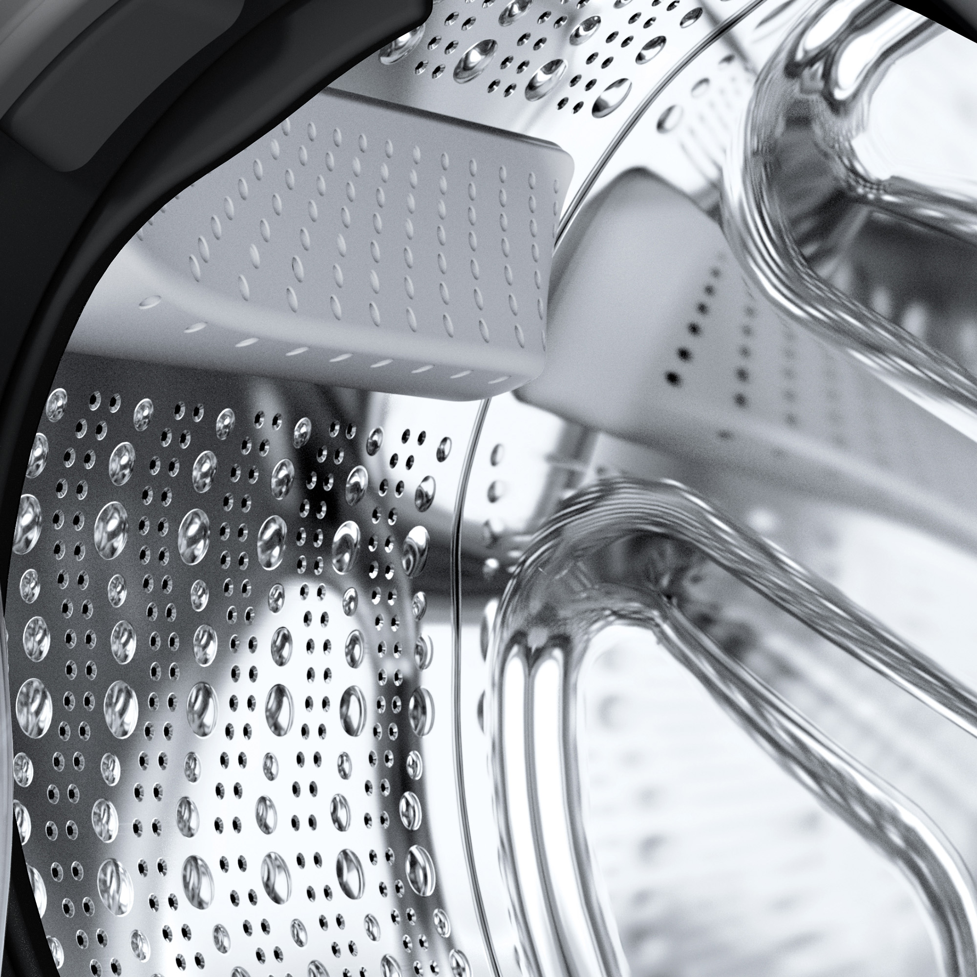 Zbliżenie wnętrza bębna pralki, pokazujące perforowany metal i krople wody.