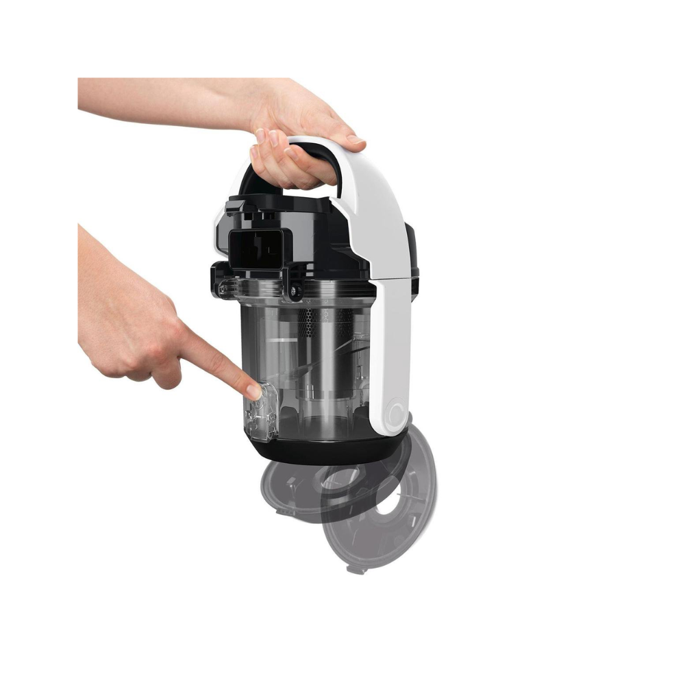 Ręka wskazująca na czarno-biały odkurzacz. Widoczny pojemnik na kurz.