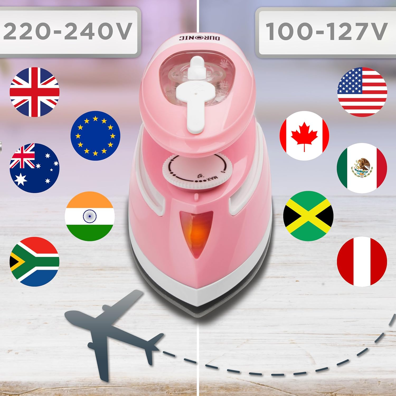 Rosa Bügeleisen mit Flaggen und Spannungsanzeigen. Es hat einen weißen Griff und ein graues Flugzeug.