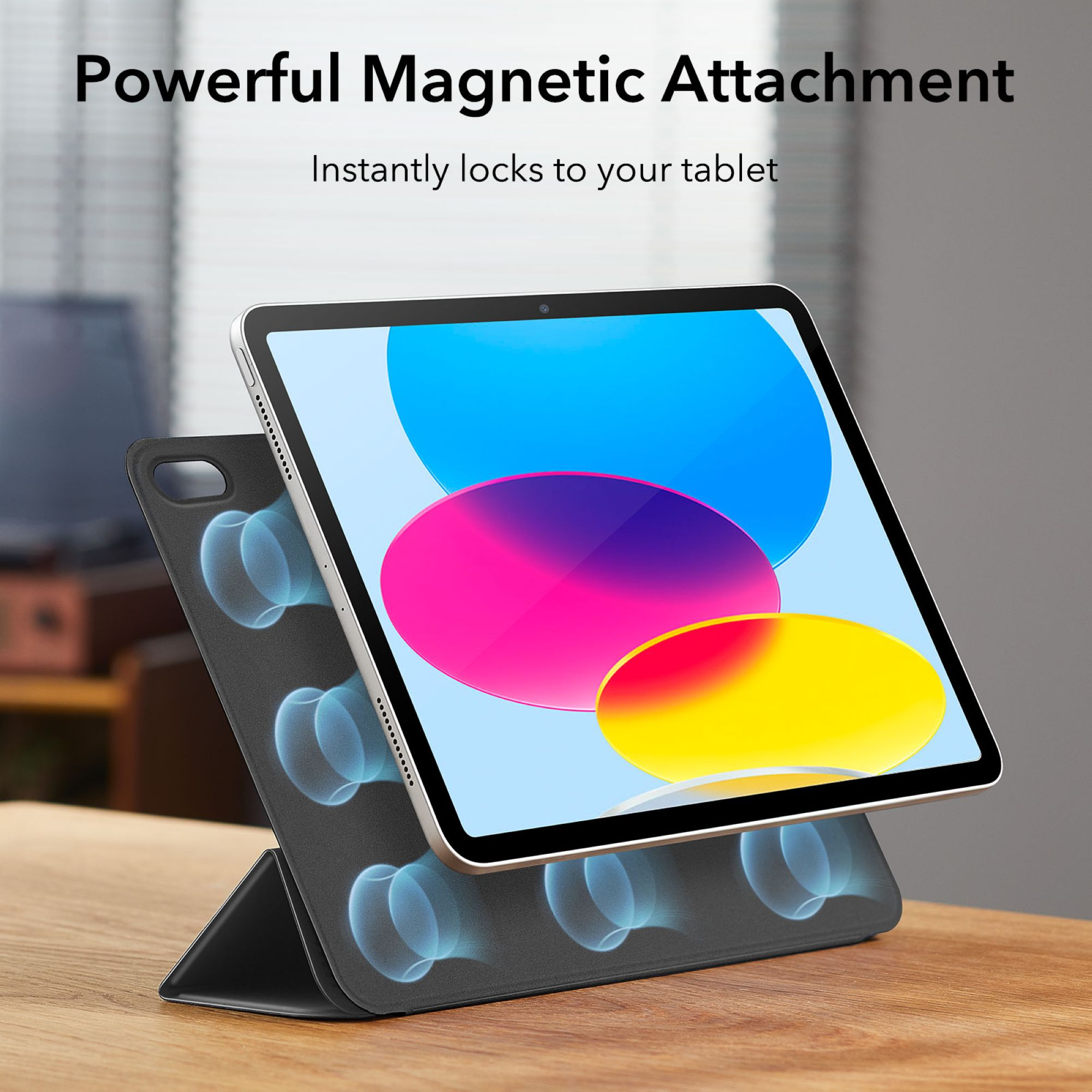 Tablet auf einem Ständer mit magnetischer Befestigung, mit farbenfrohem Bildschirm. 'Powerful Magnetic Attachment'.