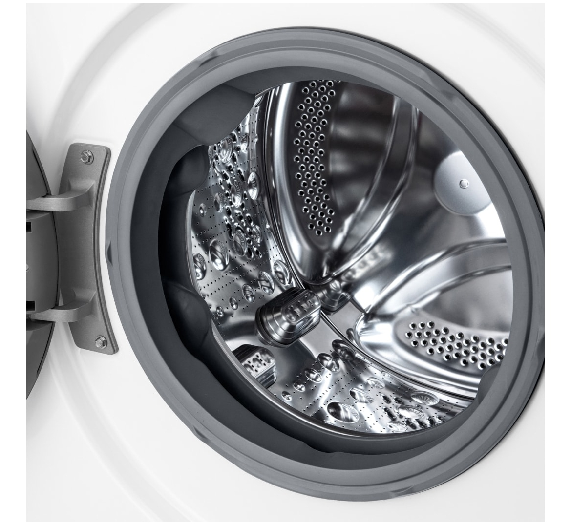 Wnętrze bębna pralki, stal nierdzewna, z otworami i centralnym mieszadłem.