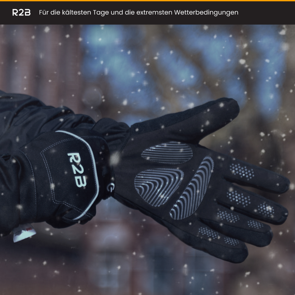 Black gloves, text R2B, with snowy background.