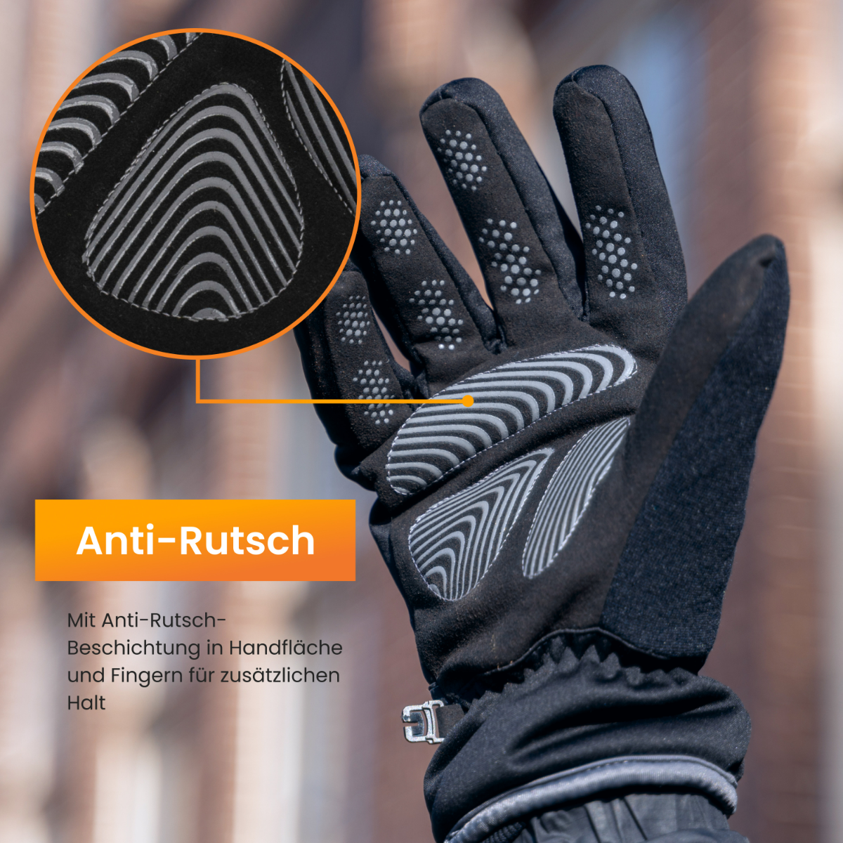 Black glove with grip features. The glove is anti-slip, with text labels.