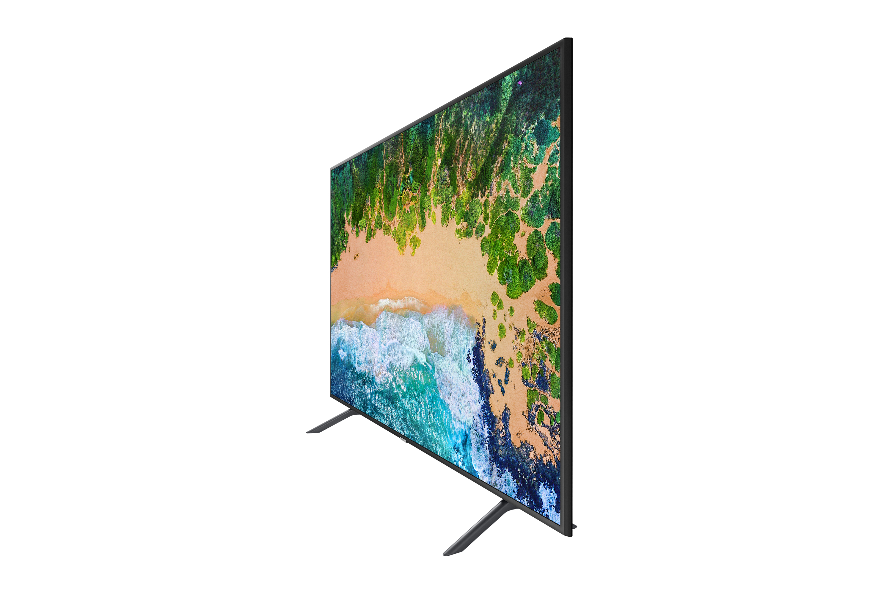 TV che mostra una scena di spiaggia con un paesaggio colorato, angolato lateralmente.