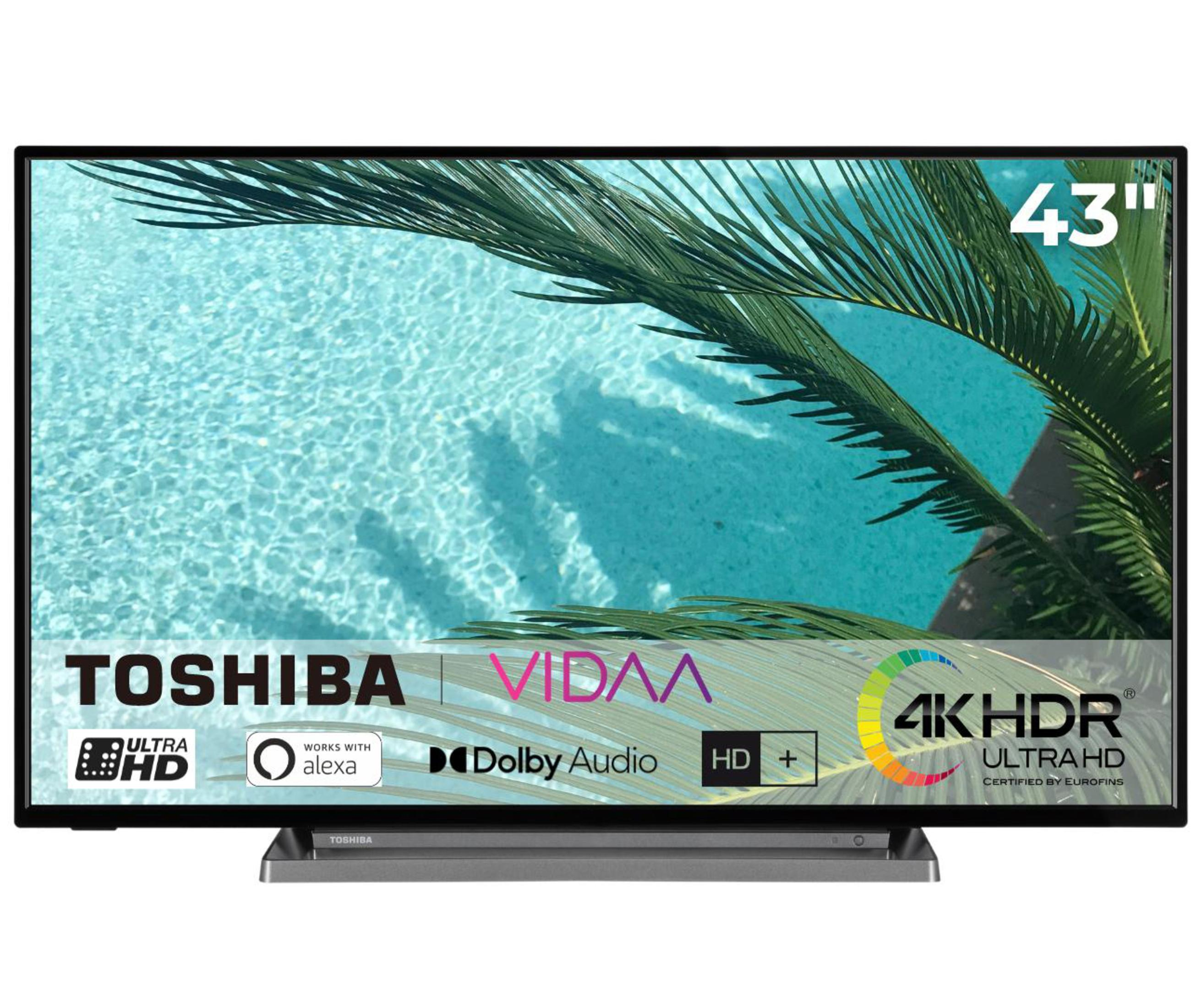 Telewizor Toshiba 43" z czarną ramką i podstawą. Wyświetla basen z palmami w tle.
