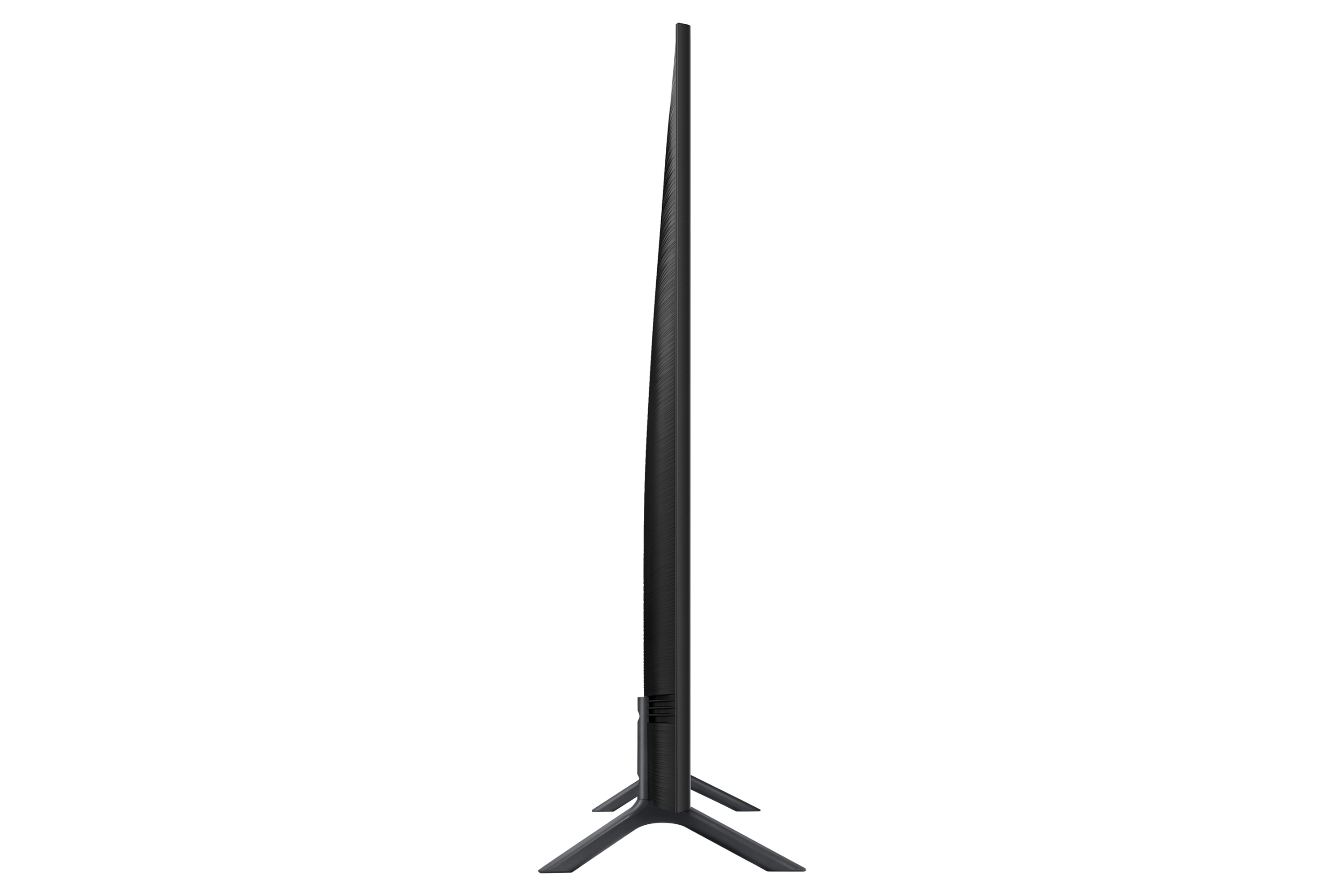 Una TV nera sottile, vista di profilo. La TV ha un supporto nero. Sfondo bianco.