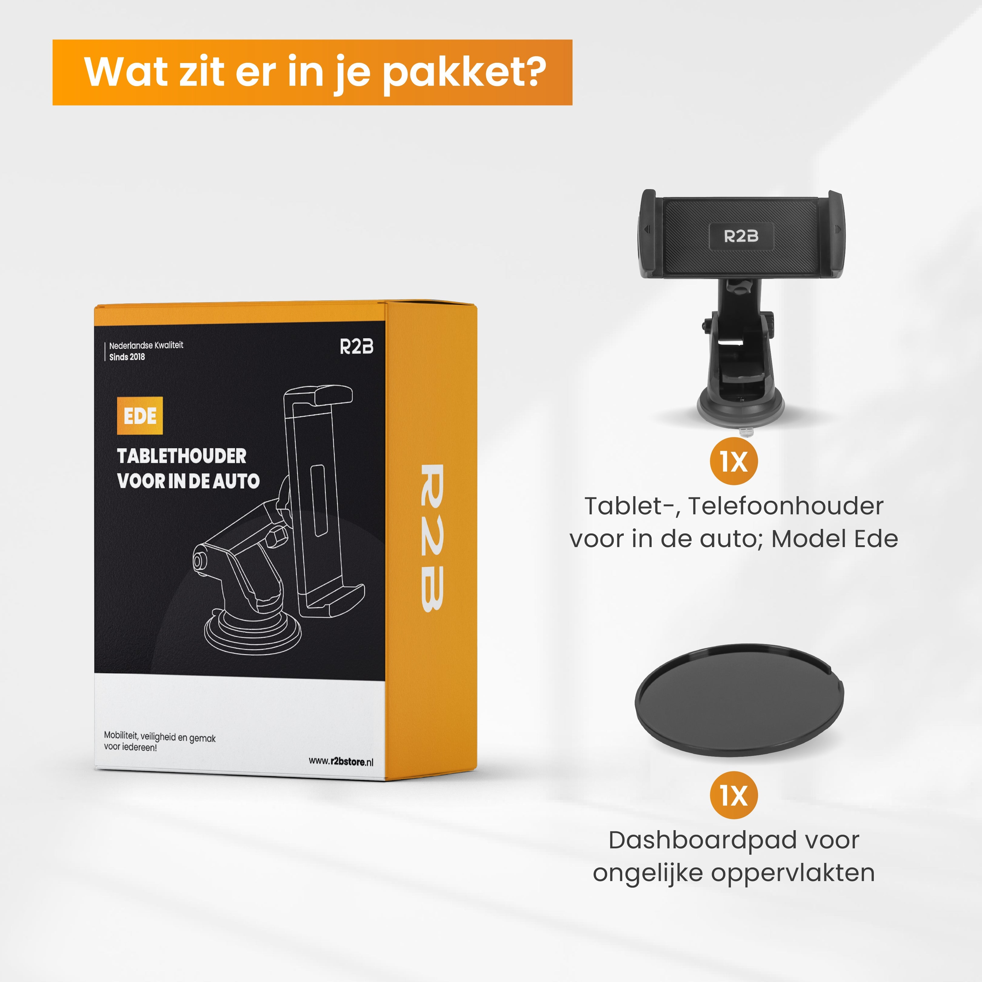 Doos en accessoires voor een tablethouder voor in de auto: tablet, dashboardpad.