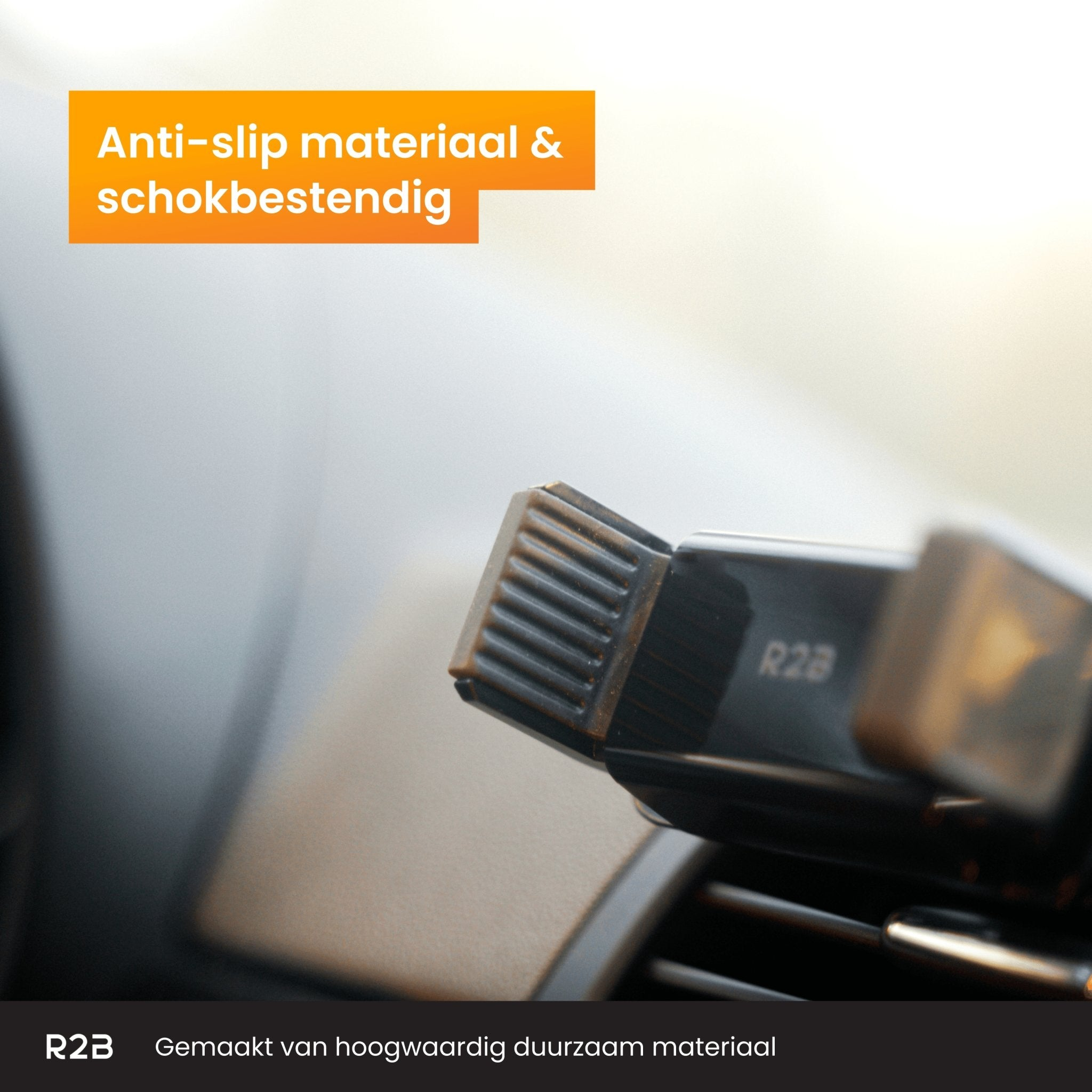 Close-up van een ventilatierooster van een auto met een telefoonhouder. Tekst: 'Antislip & schokbestendig'.