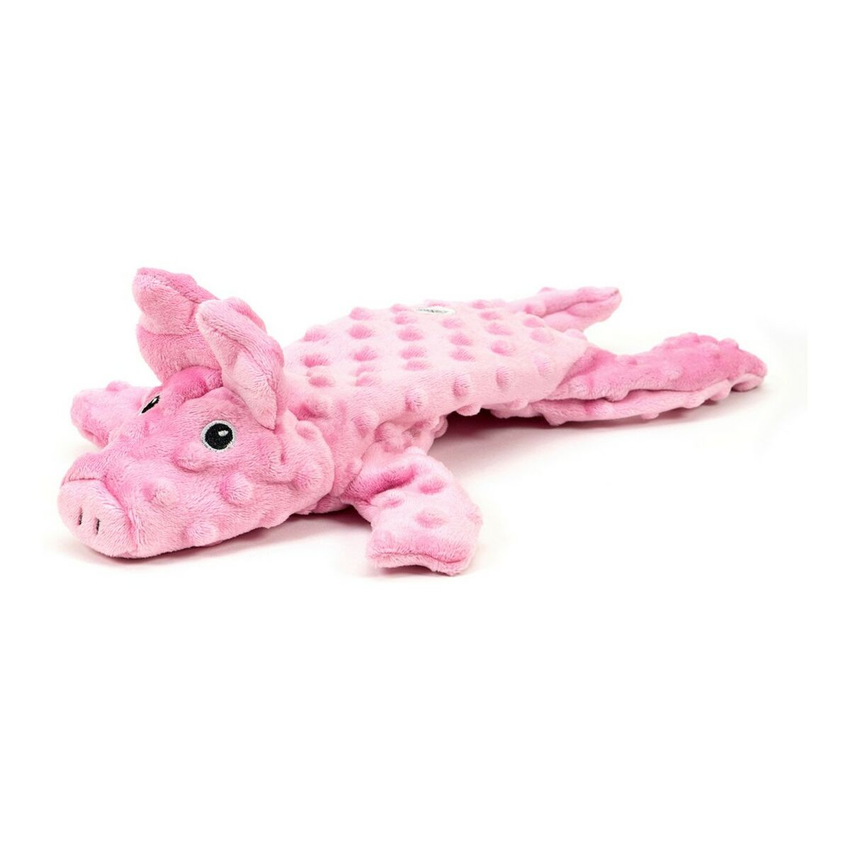 Un giocattolo a forma di maiale rosa sdraiato sulla pancia. Il giocattolo ha una pancia strutturata e piccoli arti.