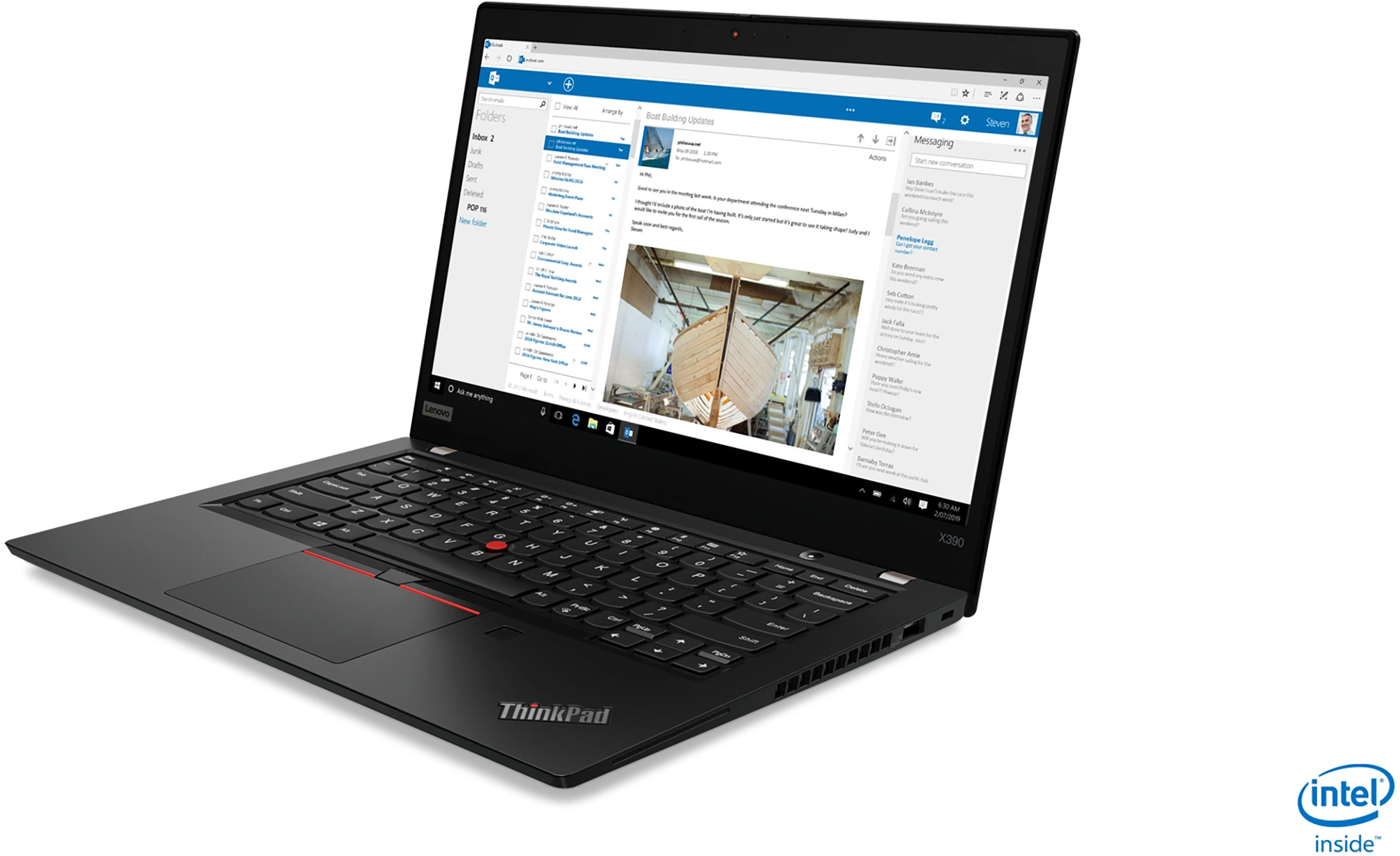 Black laptop with keyboard, screen displaying emails, and Intel sticker.