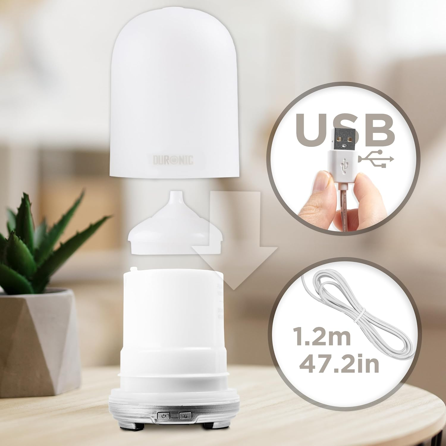 Weißer Aroma-Diffusor zerlegt, mit USB-Kabel und kleiner Pflanze auf Holztisch.