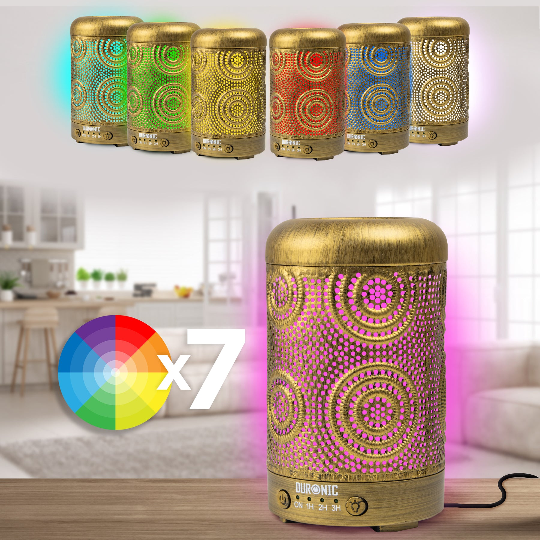 Ein goldener Diffusor für ätherische Öle mit sieben weiteren Diffusoren im Hintergrund. Ein Farbrad darunter, das die Farben zeigt.