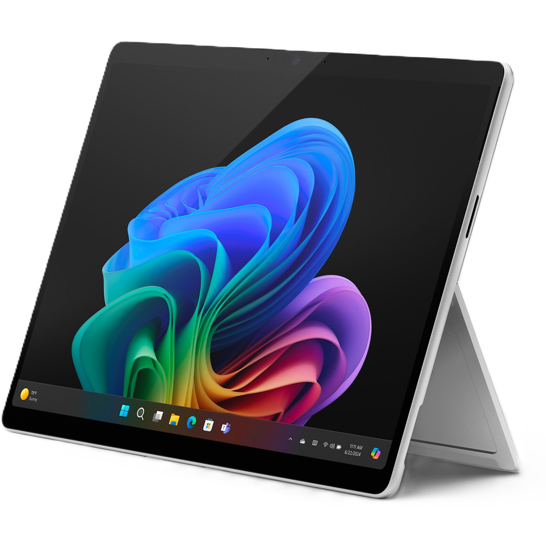 Una tableta Surface con un fondo colorido y un teclado negro en ángulo.