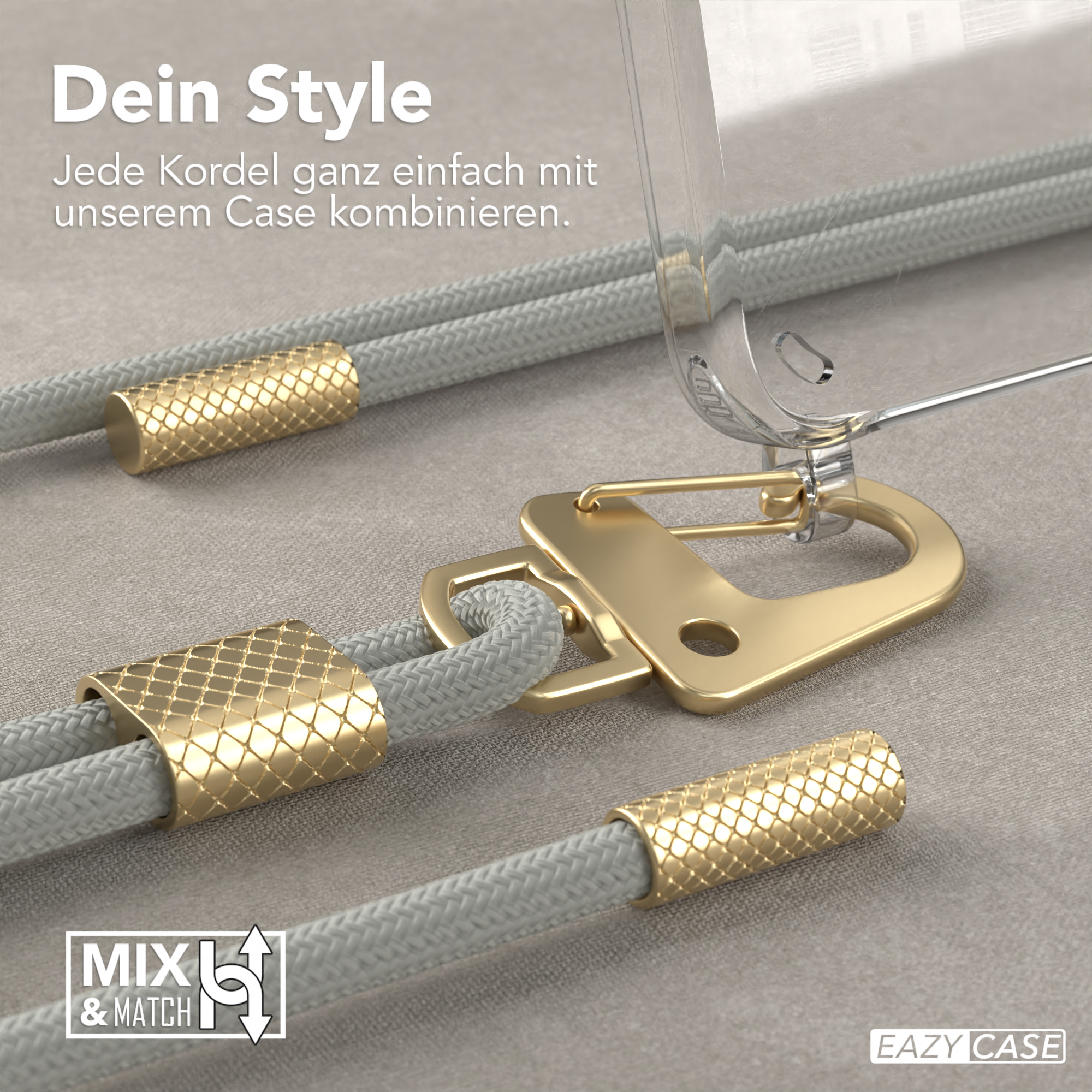 Eine Handyhülle mit einem grauen Kordelband, das an goldenen Anschlüssen befestigt ist, mit einem 'Mix & Match'-Logo.