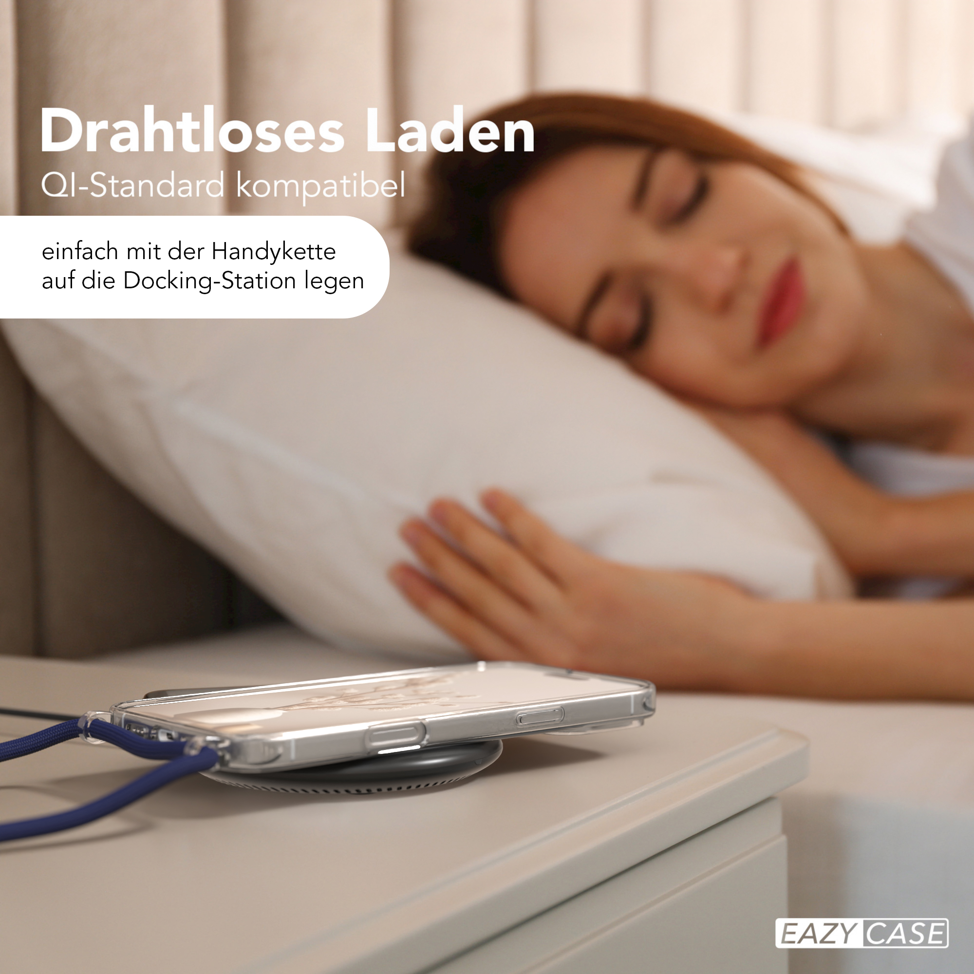 Frau schläft neben einem Nachttisch, Telefon liegt auf kabellosem Ladegerät.