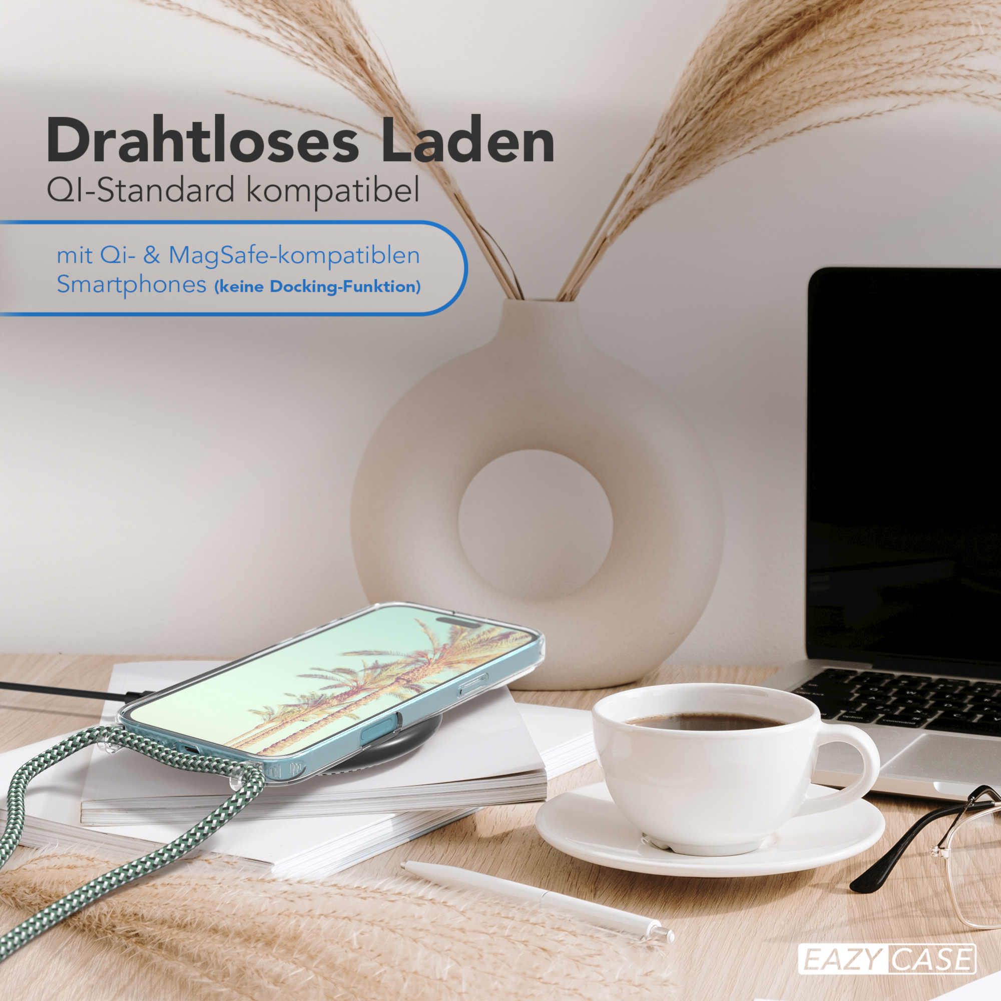 Telefon und Zubehör auf einem Tisch, mit einer Tasse Kaffee.