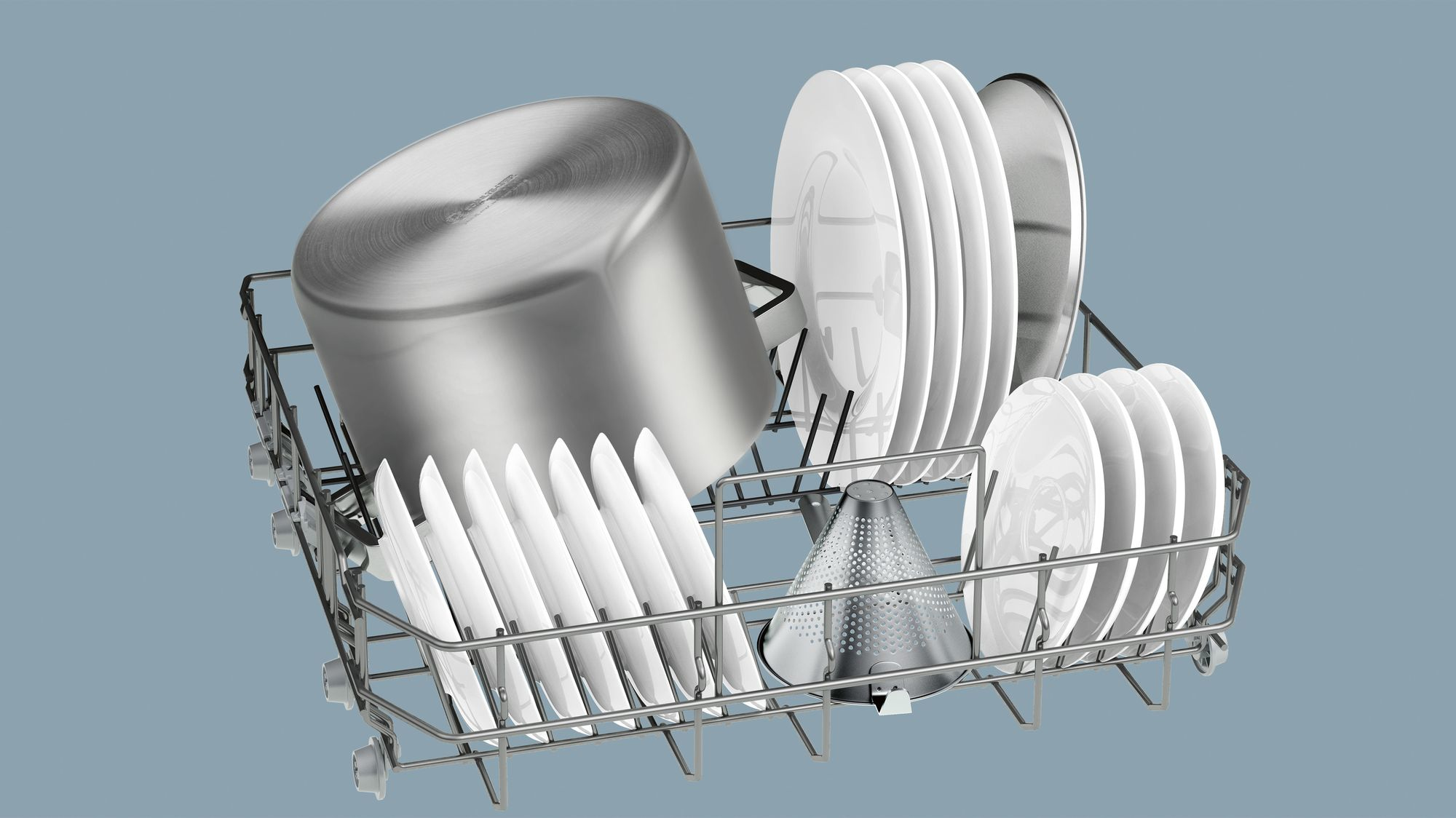 Dishwasher rack with plates, a pot, and a cone-shaped object. Plates are vertical. Background is grey.
