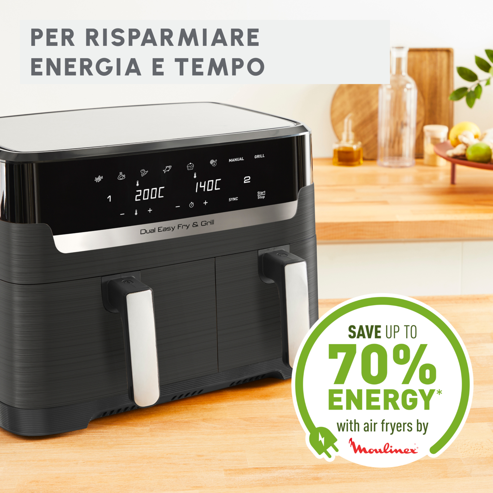 Czarna podwójna frytkownica powietrzna na drewnianej powierzchni z tekstem i zieloną odznaką oszczędności energii. Kuchnia.