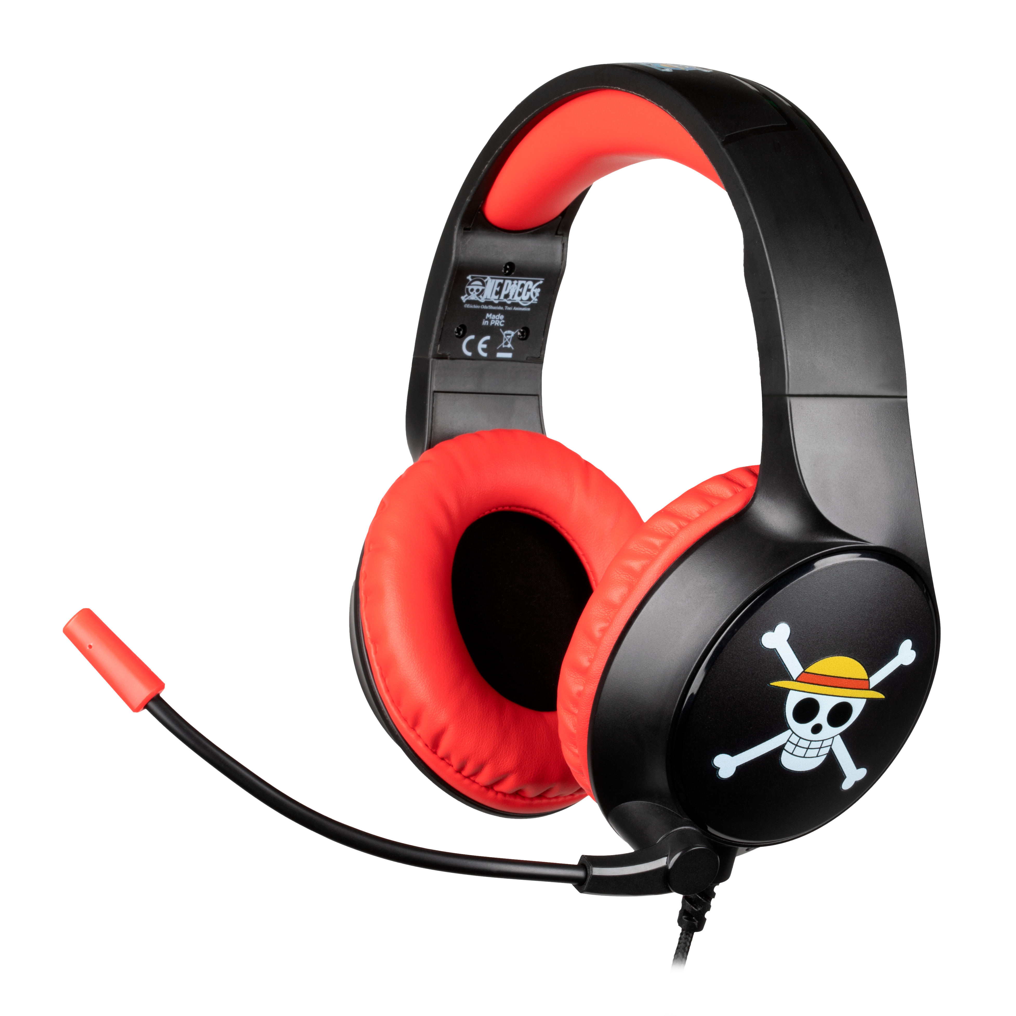 Casque gaming noir et rouge avec micro. Logo tête de mort sur écouteur.
