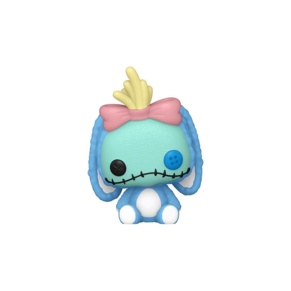 Una figura blu di Stitch con un fiocco rosa e un ciuffo di capelli gialli. Ha un occhio a bottone.