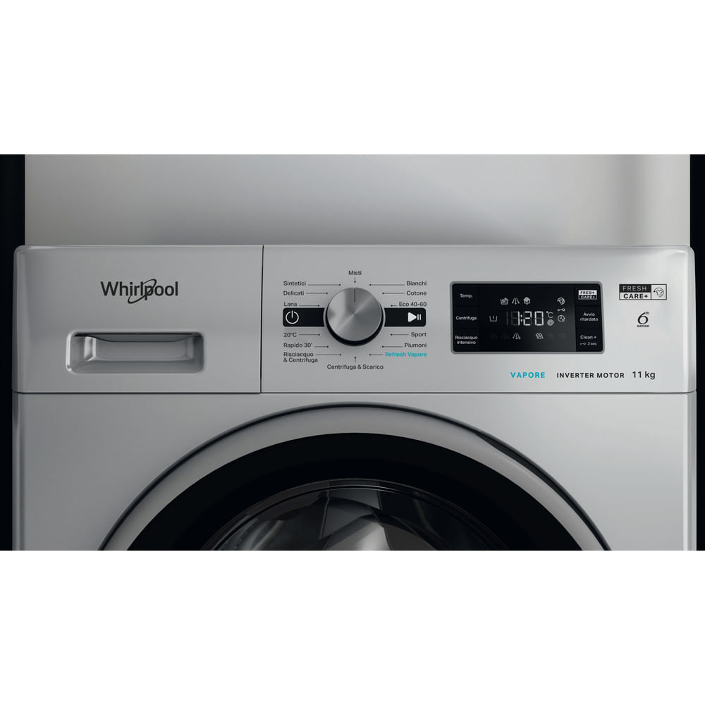 Pannello di controllo lavatrice Whirlpool. Ha un quadrante, display e pulsanti.