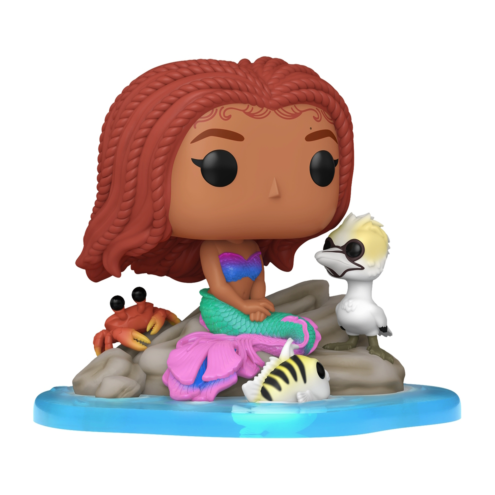 Figura Funko Pop de Ariel con Flounder, Sebastián y un cangrejo en una roca.