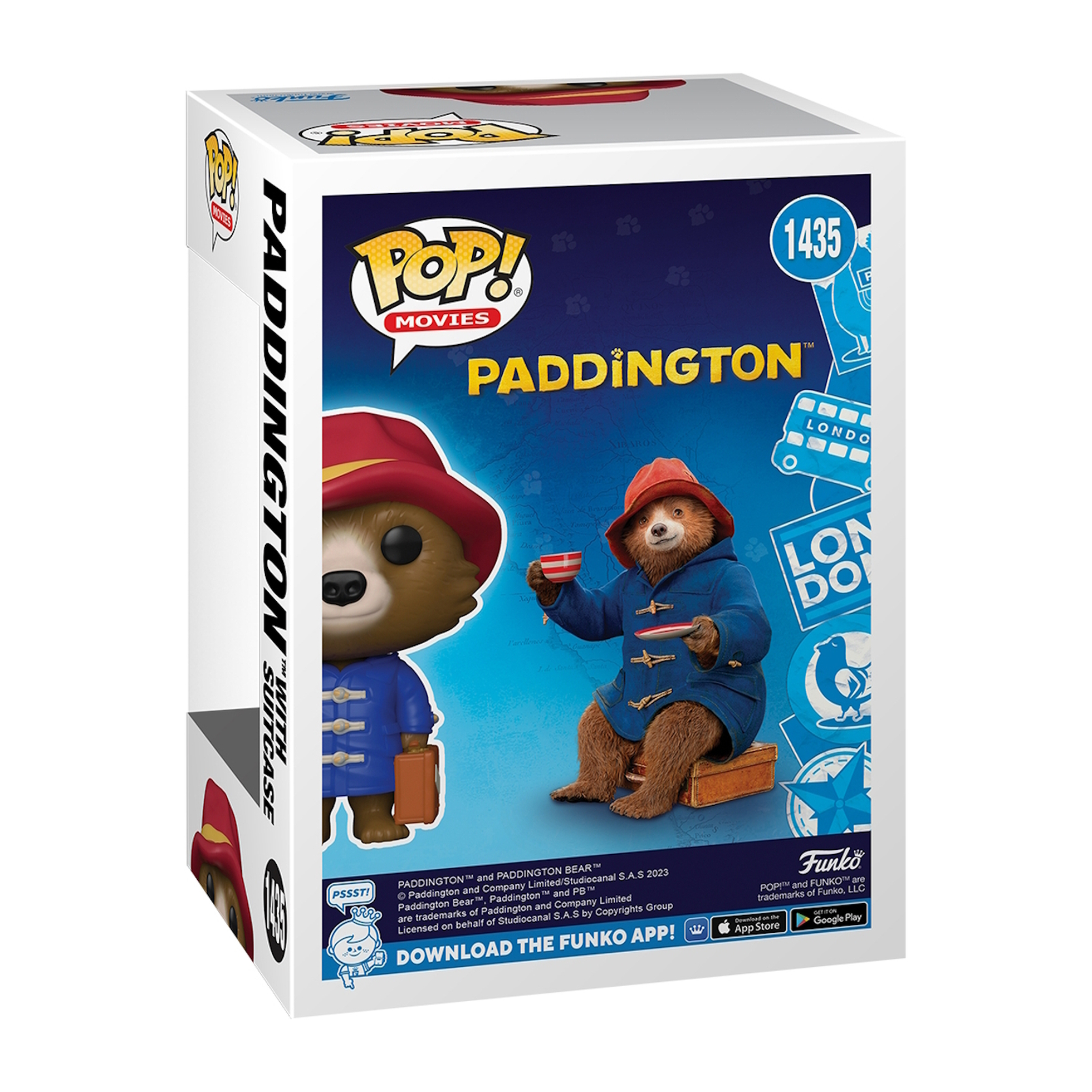 Una scatola Funko Pop di Paddington Bear con una valigia e un cappello, la scatola mostra l'orso.