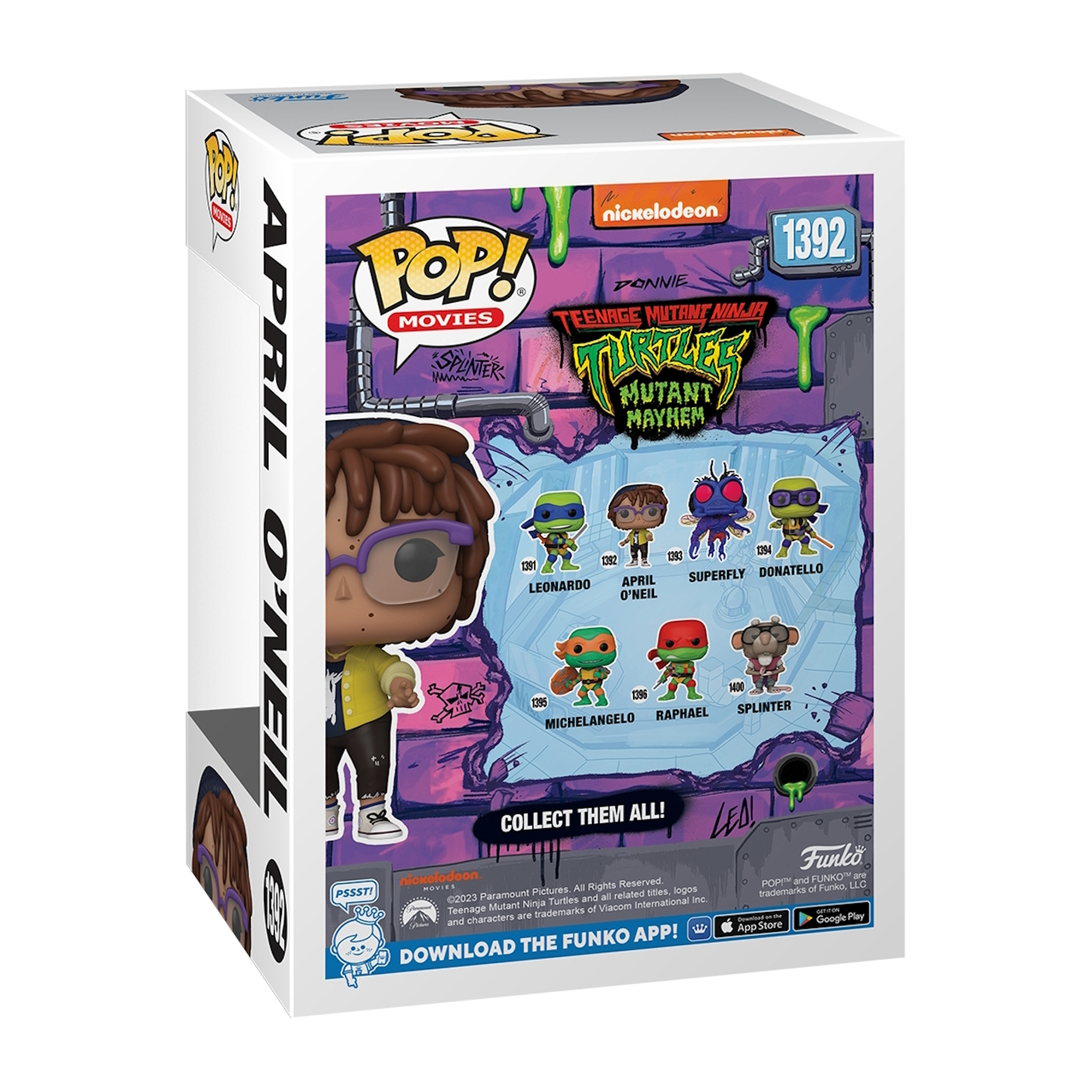 Scatola Funko Pop di April O'Neil. La figura indossa occhiali, giacca gialla e tiene in mano un microfono.