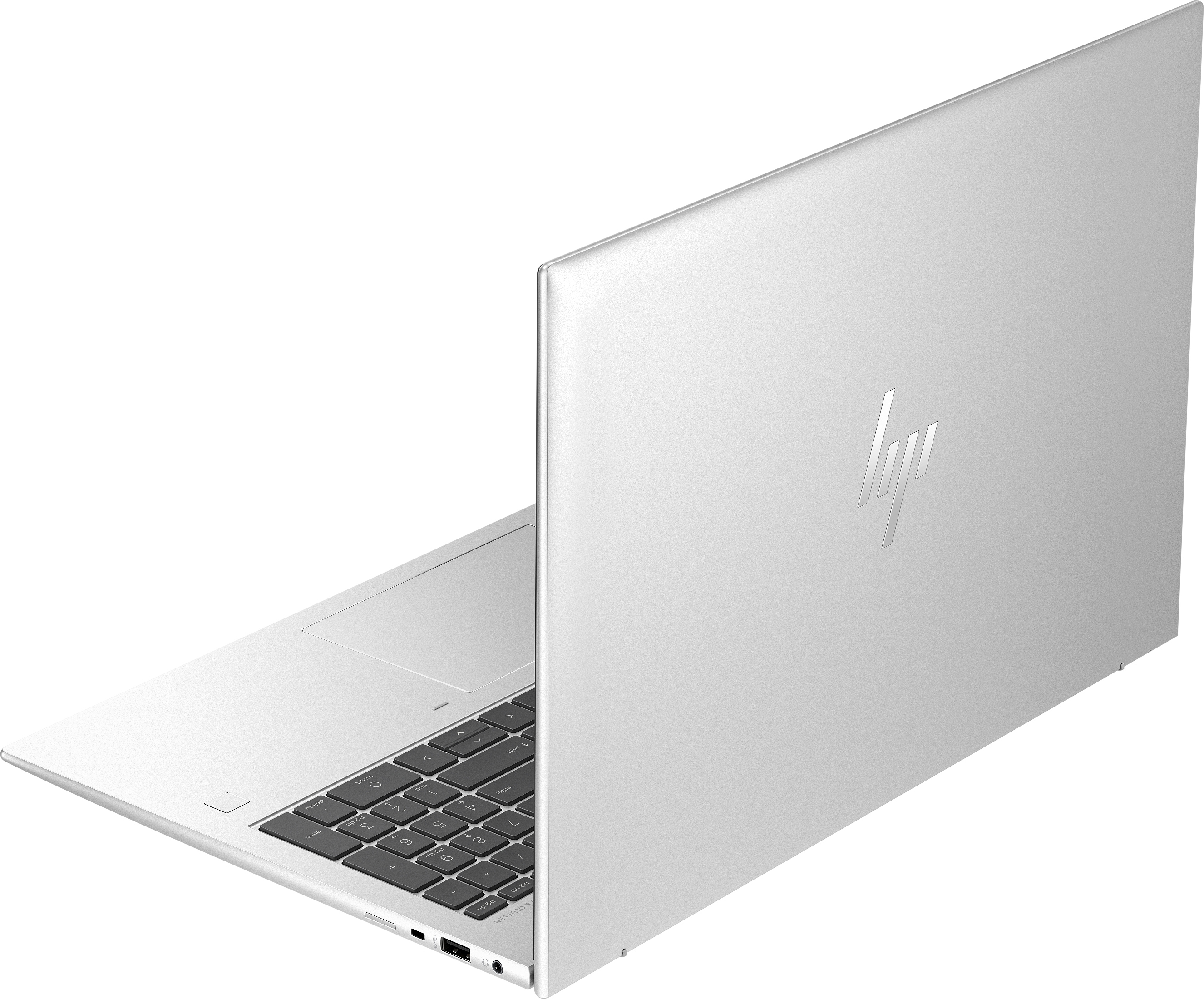 Srebrny laptop HP, otwarty pod kątem, z logo HP na tylnej obudowie.