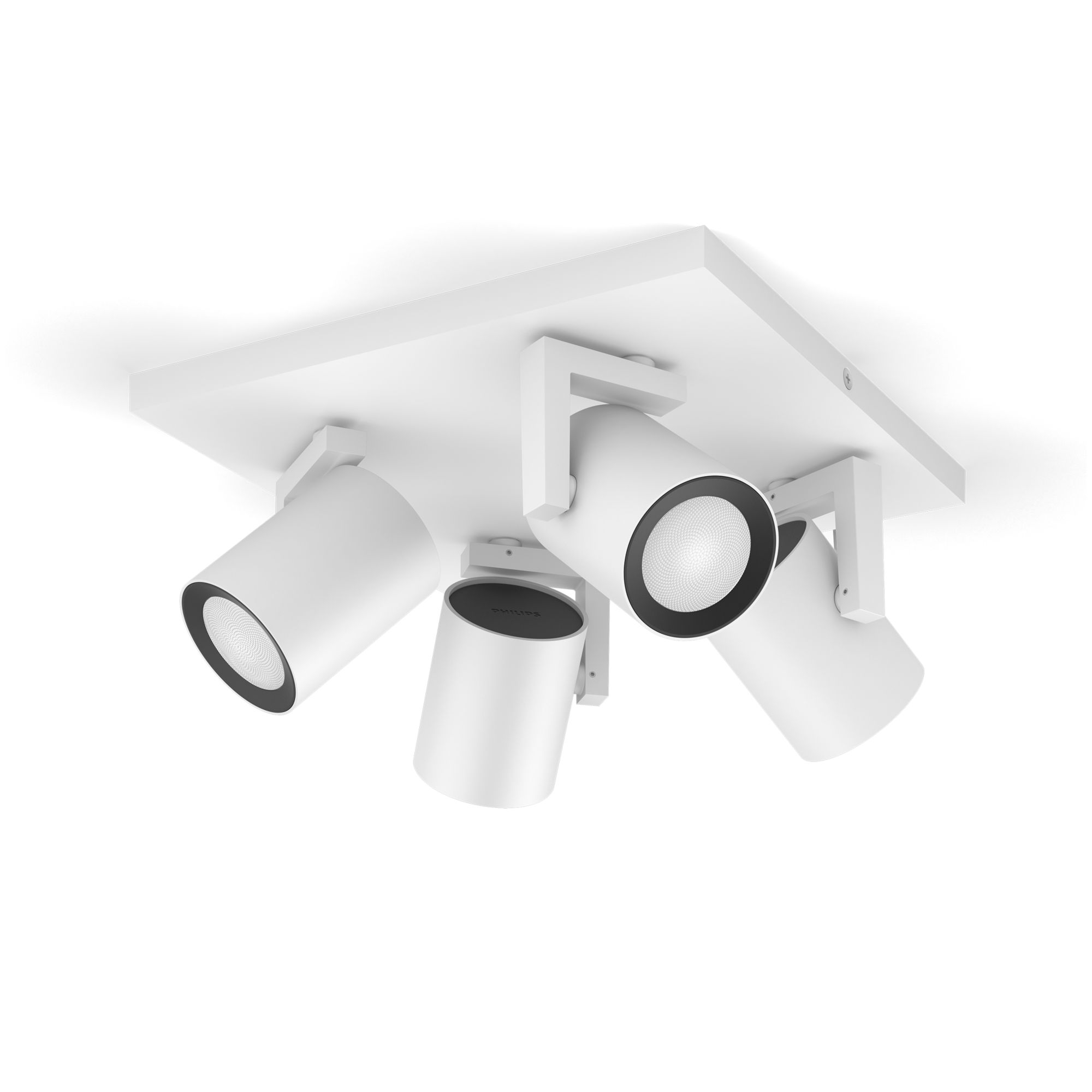 Plafond met vier witte spots. De lichten staan in verschillende richtingen.