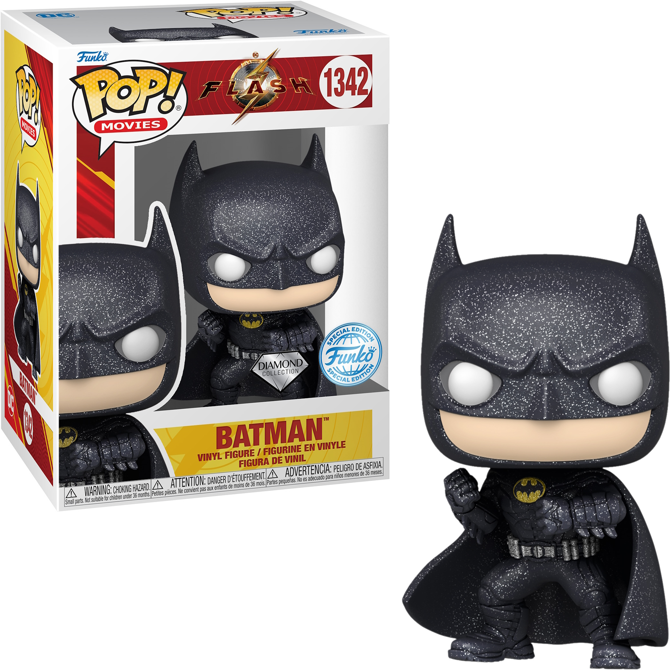 Batman-Figur mit einer Box. Die Figur ist schwarz mit Glitzer.