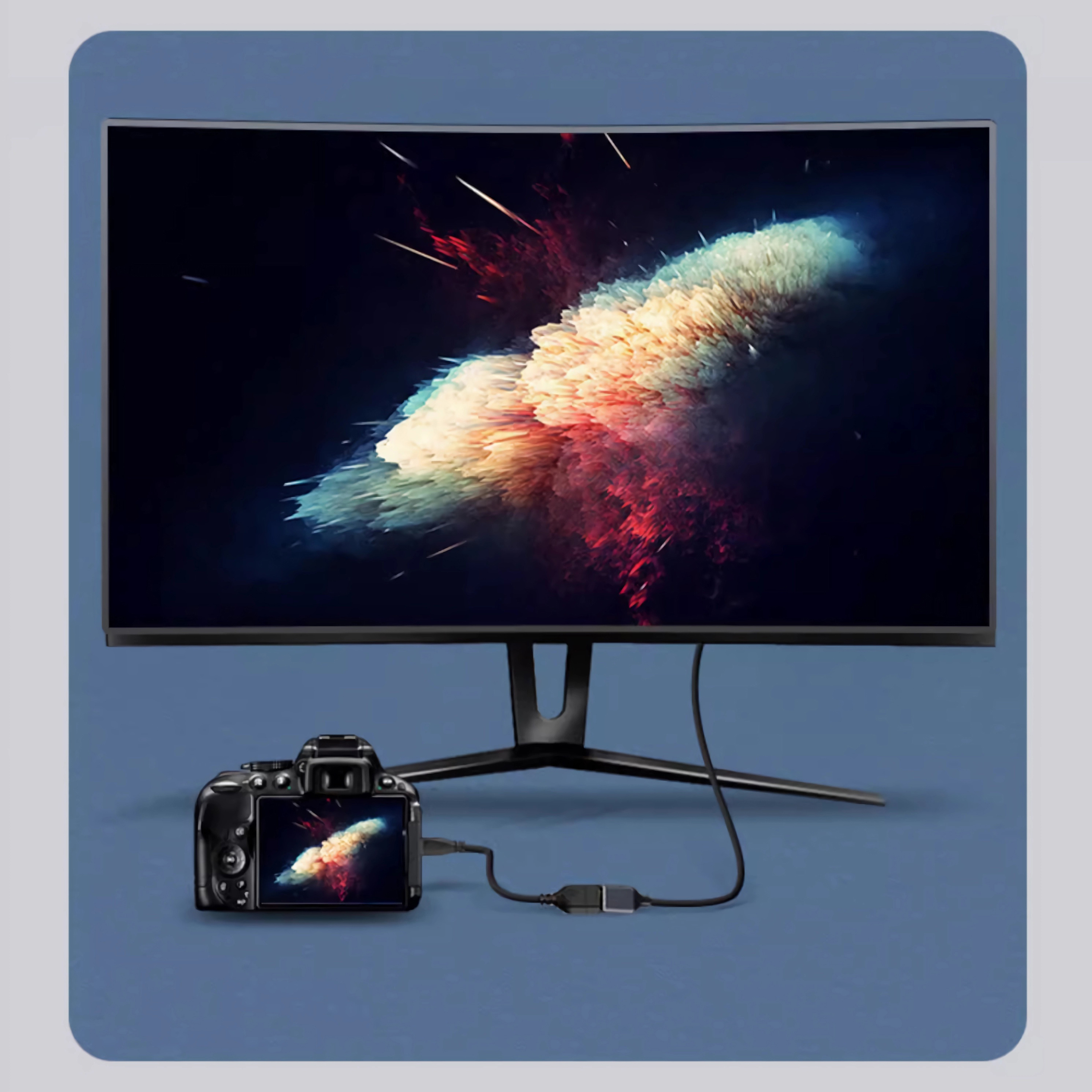 Kamera, die mit einem Monitor verbunden ist, zeigt farbenfrohe abstrakte Kunst.