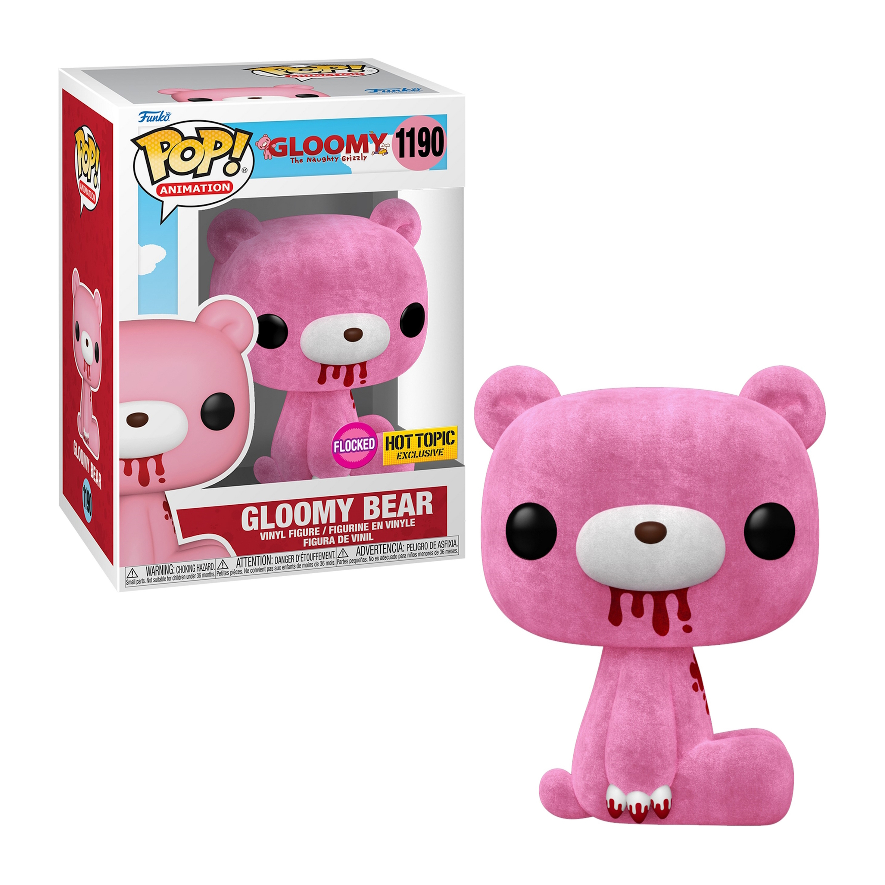 Ein rosa Gloomy Bear-Spielzeug in einer Box, neben dem Spielzeug.