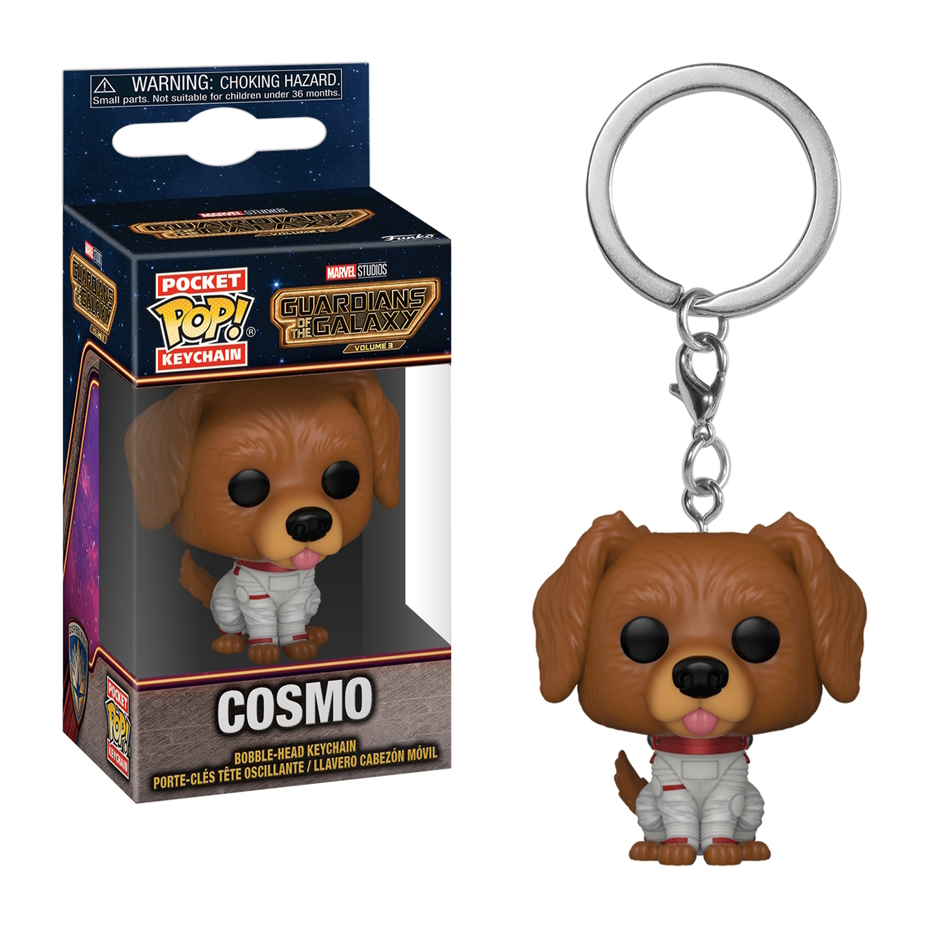 Cosmo Schlüsselanhänger mit Box. Die Figur ist ein brauner Hund in einem weißen Raumanzug.