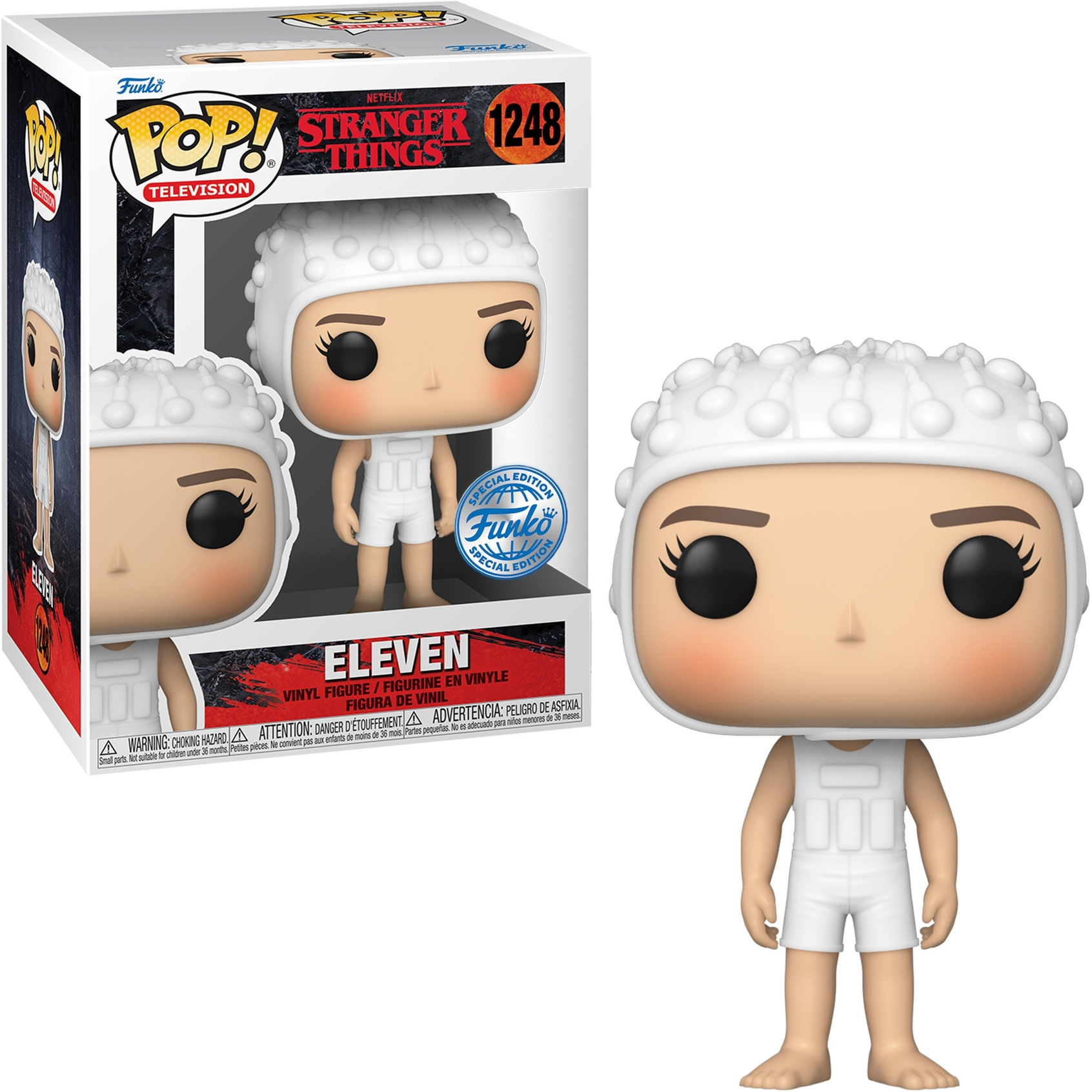 Eleven Funko Pop Figur. Trägt ein weißes Outfit mit Kopfbedeckung, steht. Die Box zeigt die Figur.