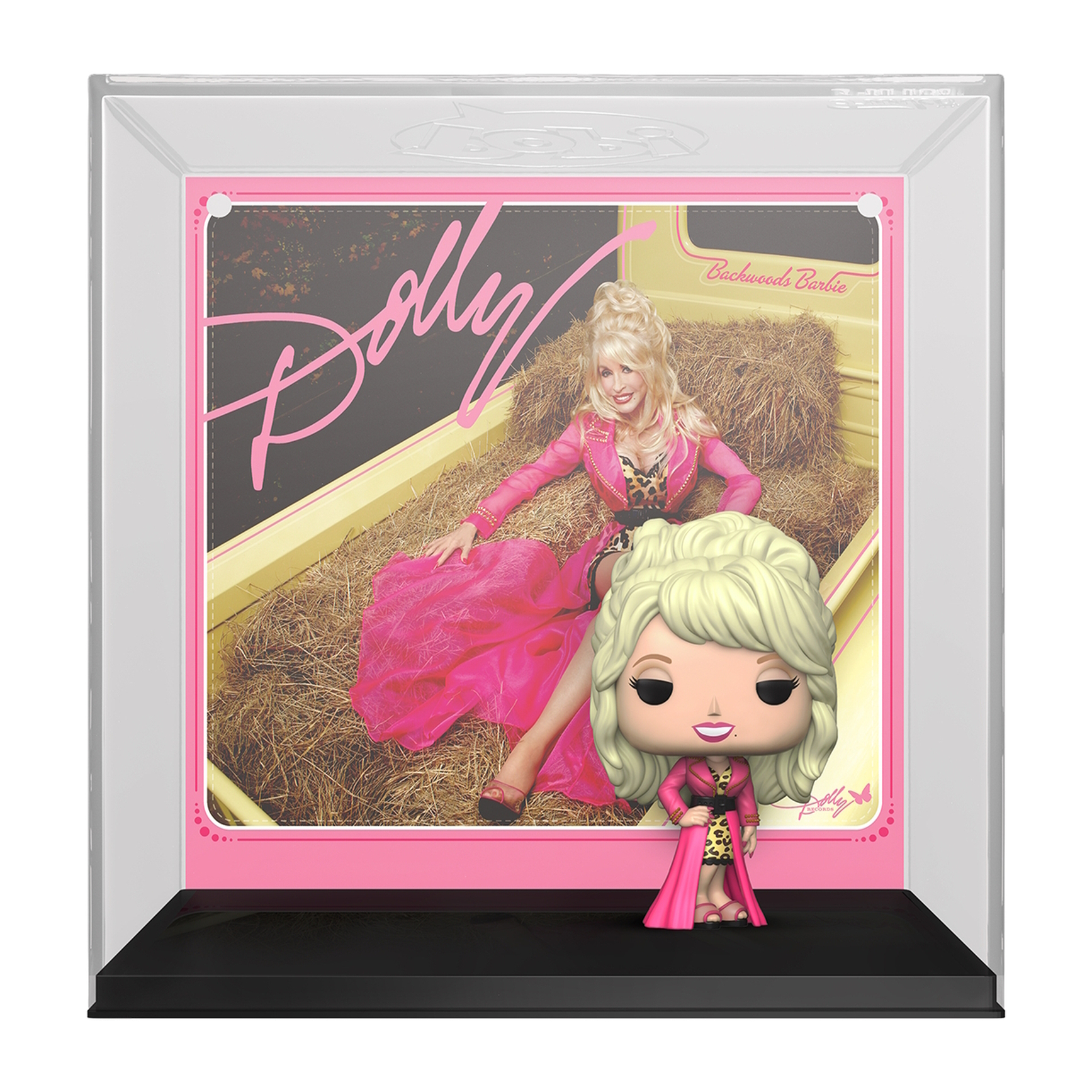 Personaggio giocattolo di Dolly Parton. Indossa un vestito rosa con un cartello rosa dietro di lei.