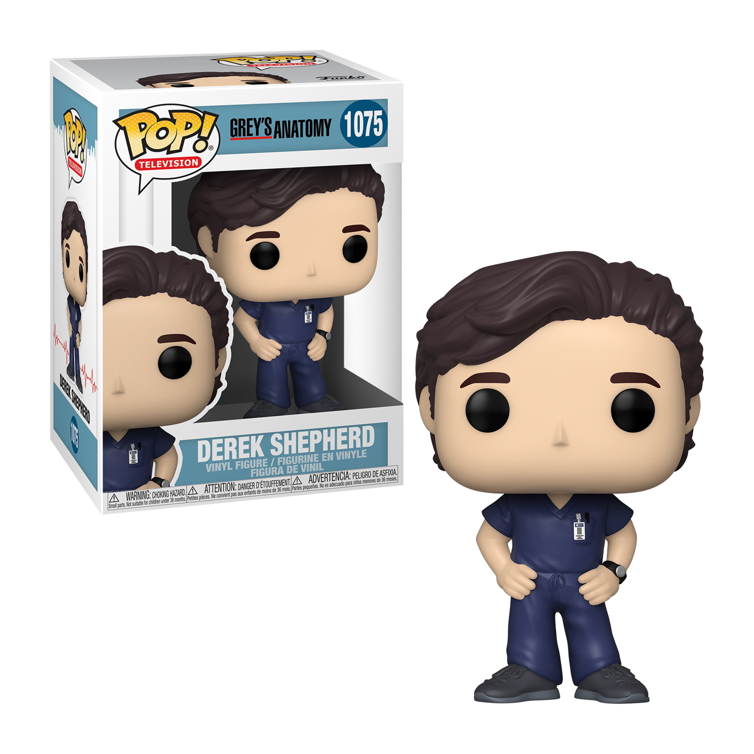 Derek Shepherd Figur mit blauen OP-Kitteln, schwarzen Haaren und einer Uhr. Verpackt mit Derek-Bild und Unterschrift.