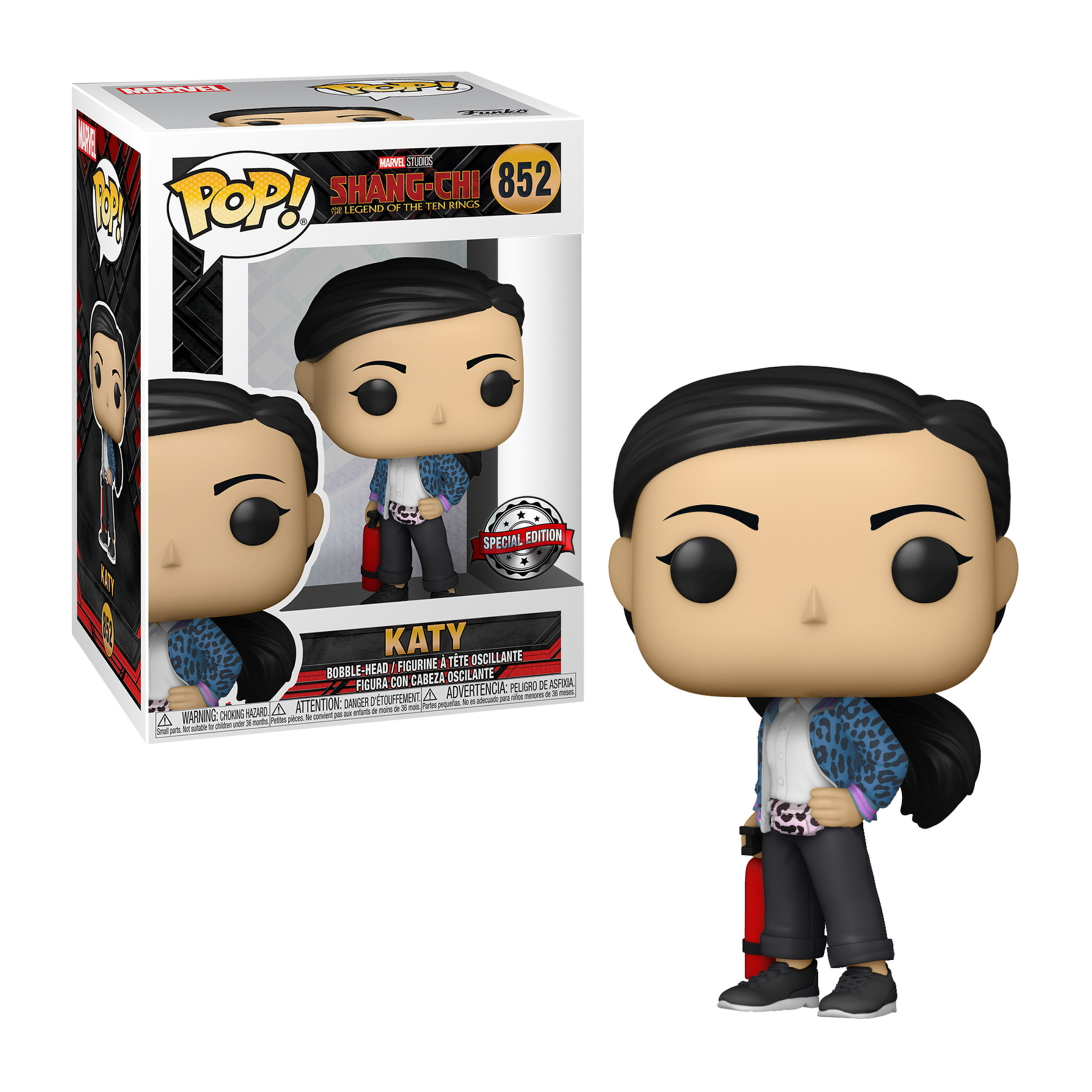 Katy Funko Pop Figur, trägt eine blaue Jacke, schwarze Hose und ein rotes Objekt, steht neben einer Box.