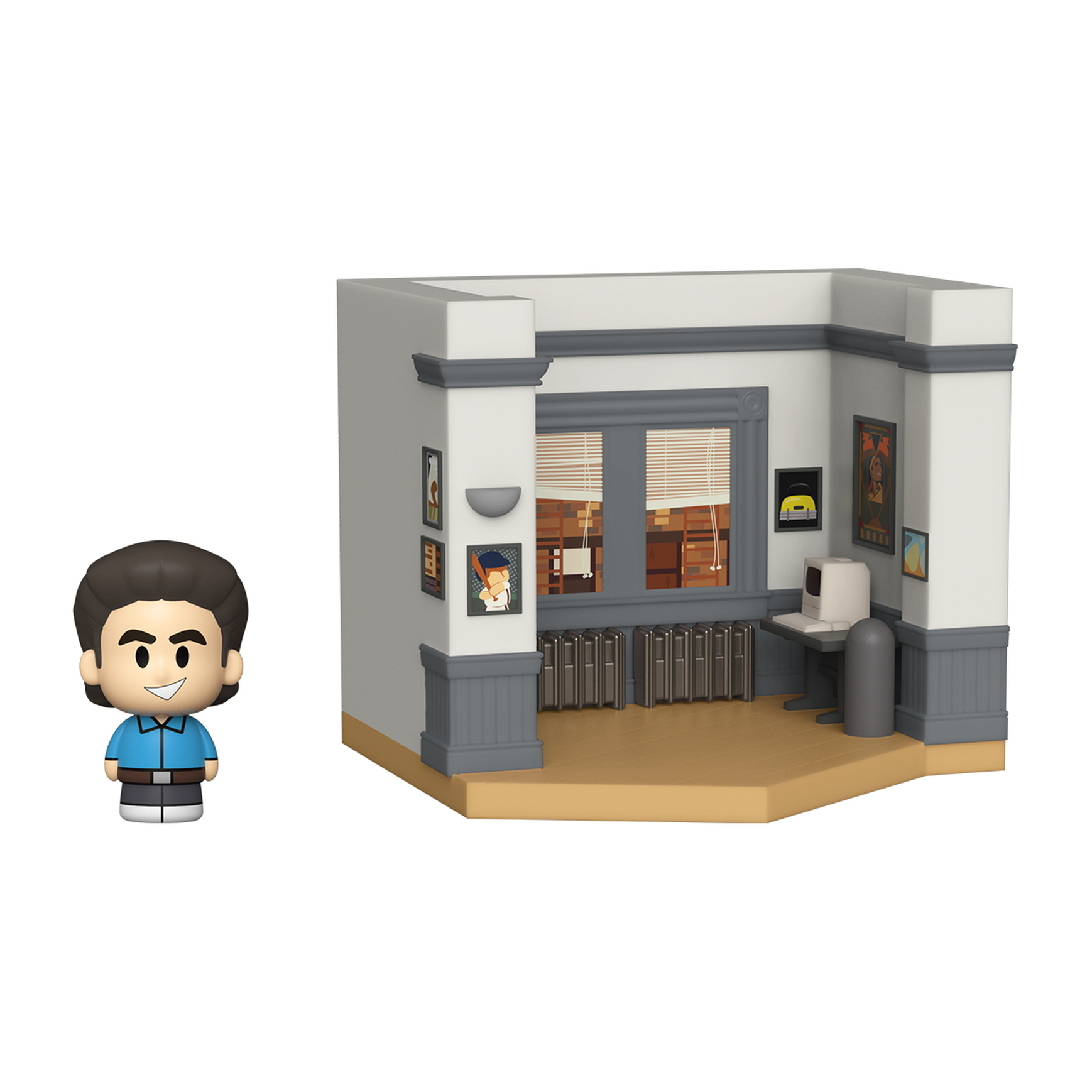 Funko Pop Figur von Jerry Seinfeld, neben einem Diorama seiner Wohnung stehend.