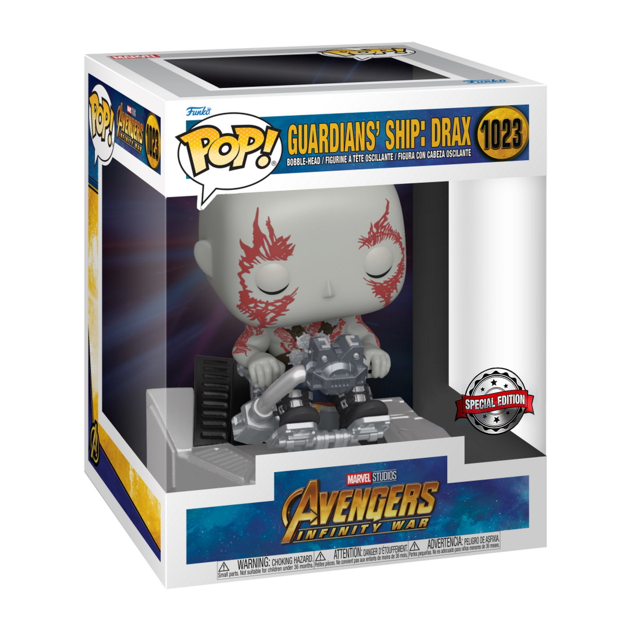 Drax Funko Pop Figur in Box. Grauhäutiger Mann sitzt auf Plattform mit Waffe.
