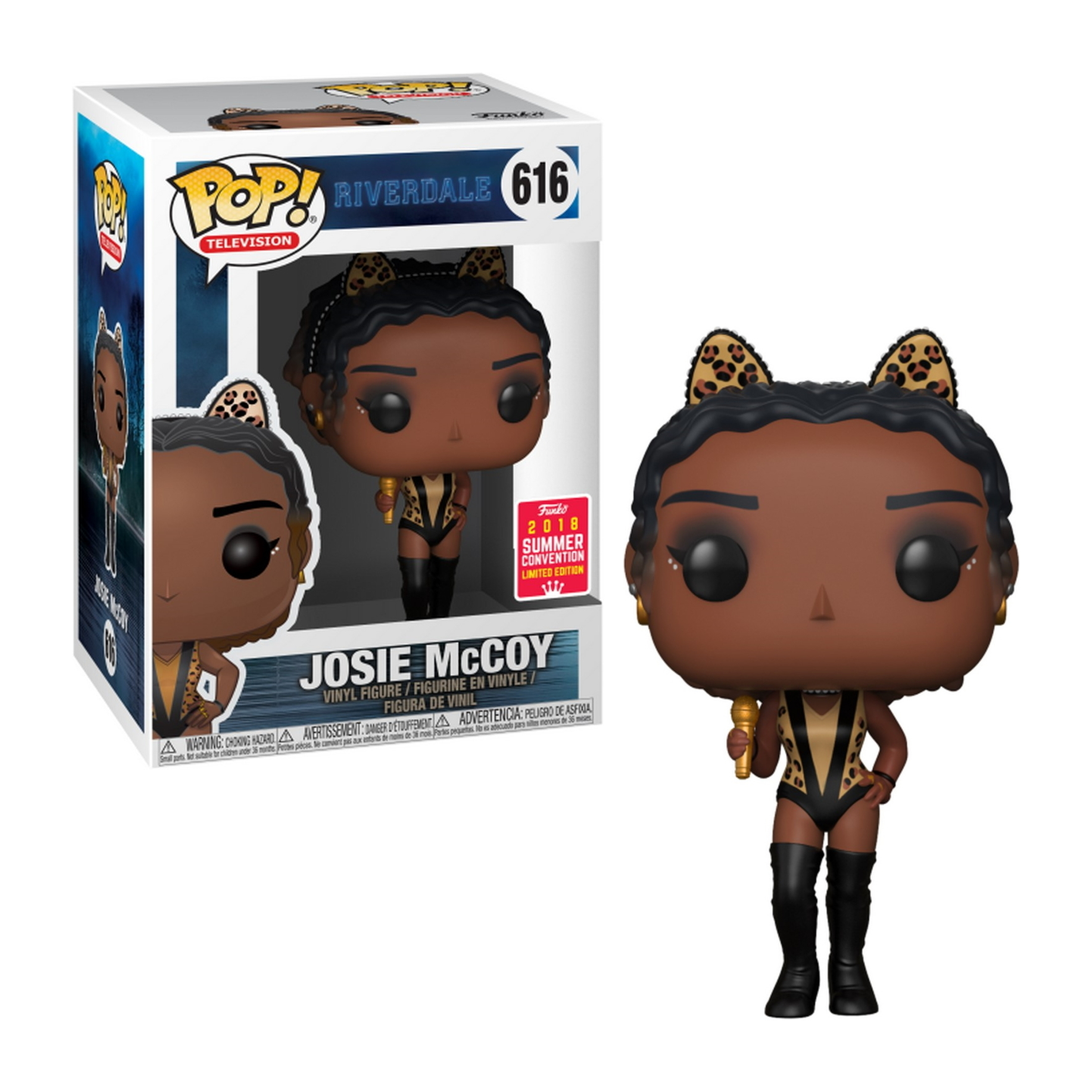 Josie McCoy Figur in einem schwarz-goldenen Outfit, die ein Mikrofon hält. Sie trägt schwarze Stiefel.