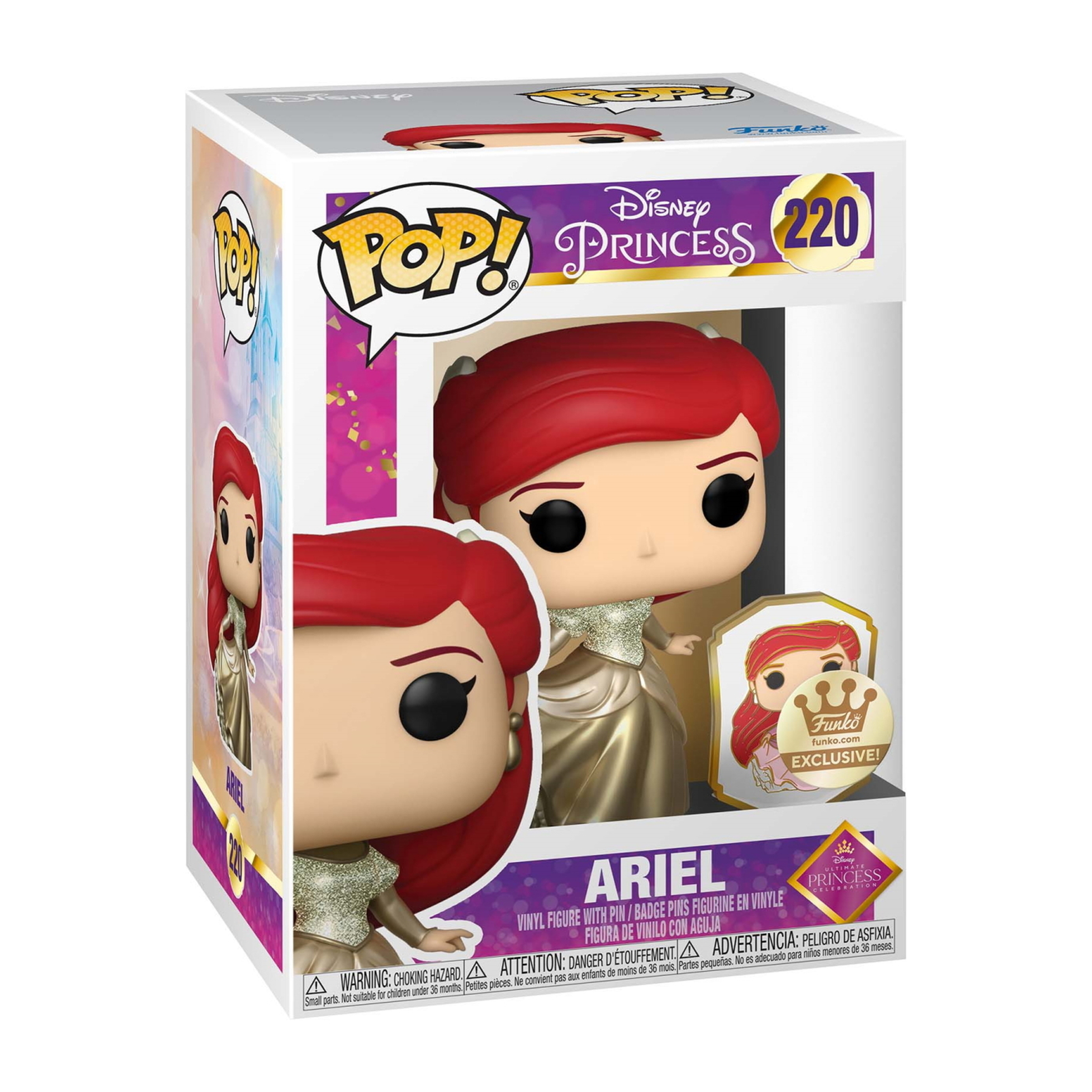 Ariel Figur in einer Box. Die Figur trägt ein goldenes Kleid und hat rotes Haar.