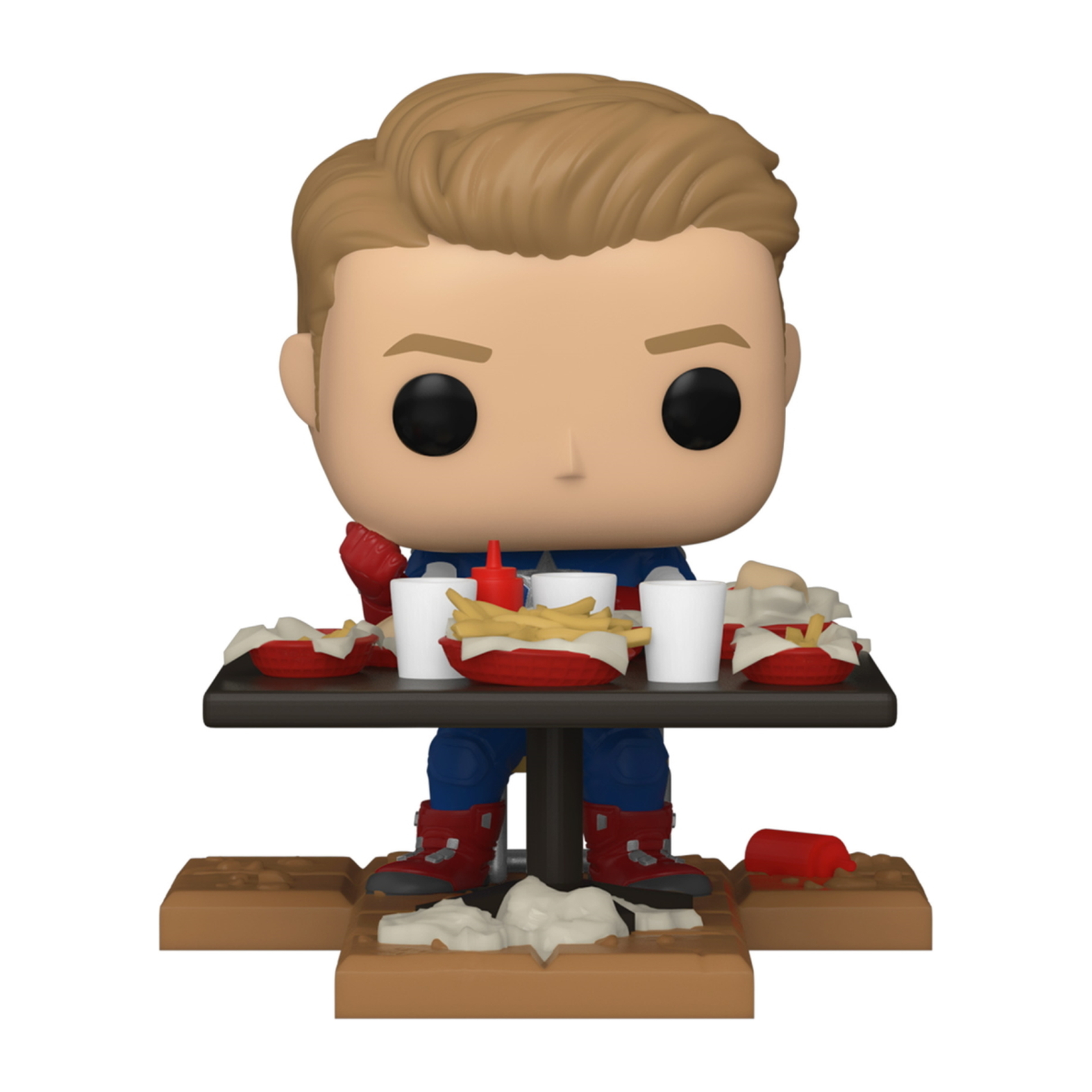 Eine Captain America Funko Pop Figur, die Pommes und einen Burger an einem kleinen Tisch isst.