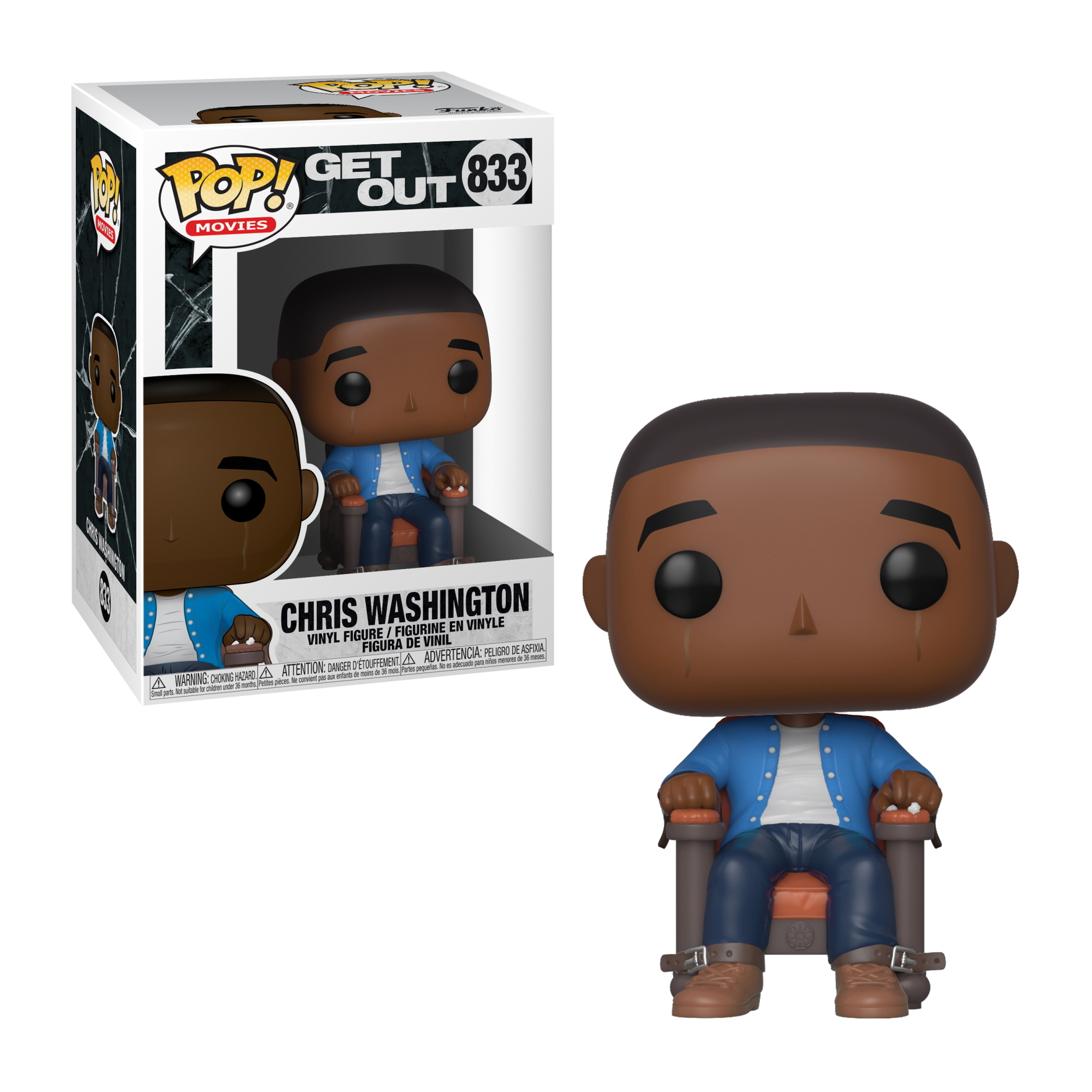 Figurka Chrisa Washingtona siedząca na krześle, płacząca, z niebieską kurtką i pudełkiem po lewej stronie.