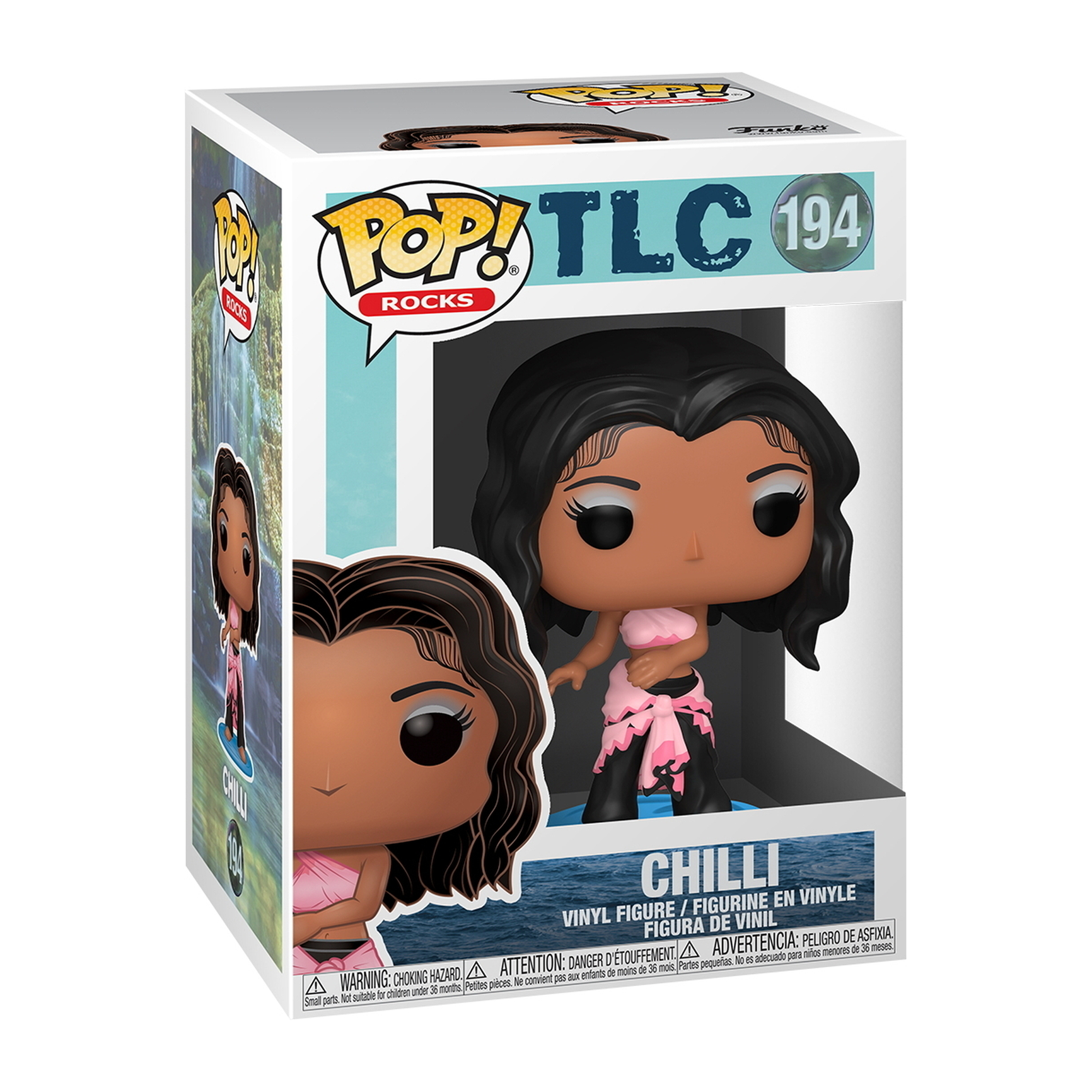 Chilli Vinylfigur in einer Box. Figur trägt rosa Oberteil, schwarze Hose und rosa Schal. Hintergrund ist eine blaue Szene.